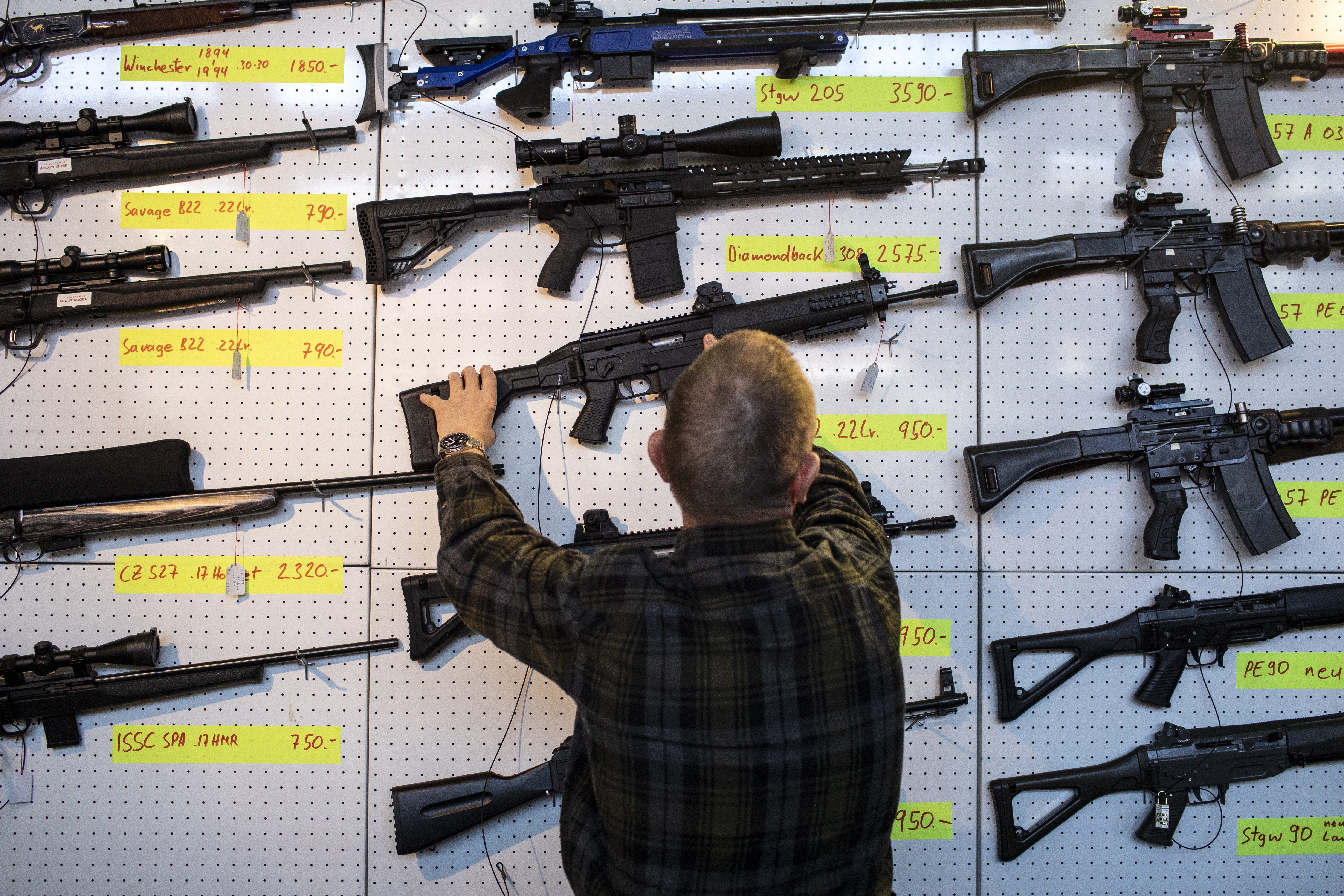Guns are presented during the 45th International Arms Collector's Fair Lucerne, in Lucerne, Switzerland. Photo: EPA-EFE