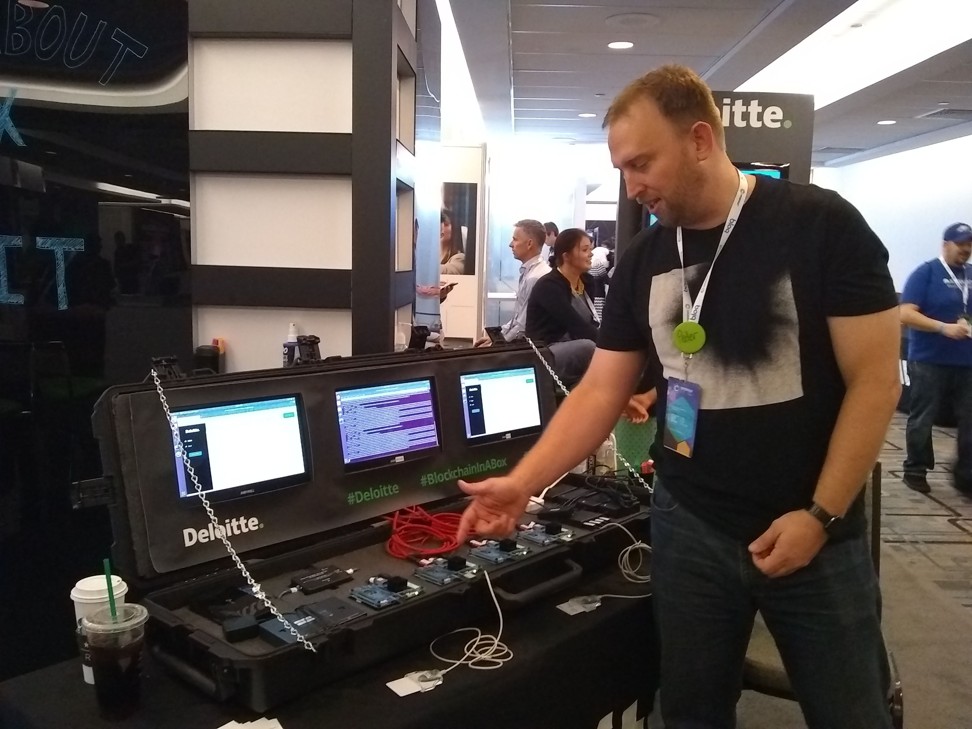 A man demonstrates a blockchain application during the Consensus 2019 conference on cryptocurrency and blockchain technology, in New York on May 15, 2019. Photo: AFP