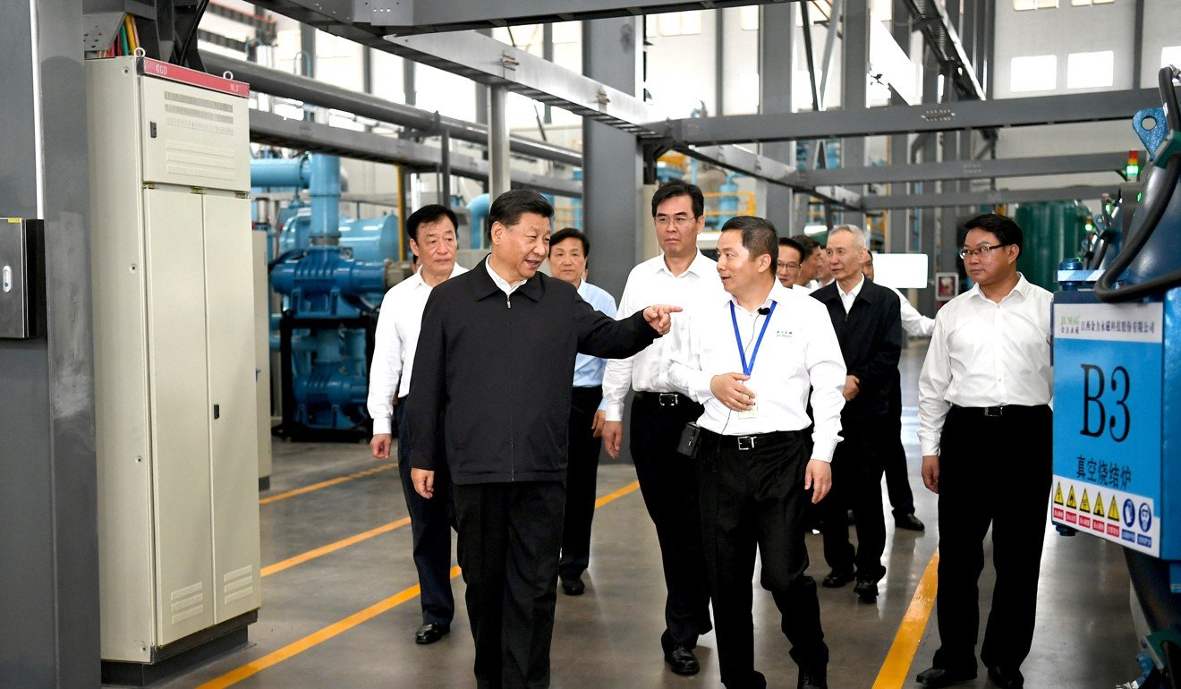 Chinese President Xi Jinping visits a rare earth minerals production facility in China's eastern Jiangxi province on Monday, May 20. Photo: Xinhua