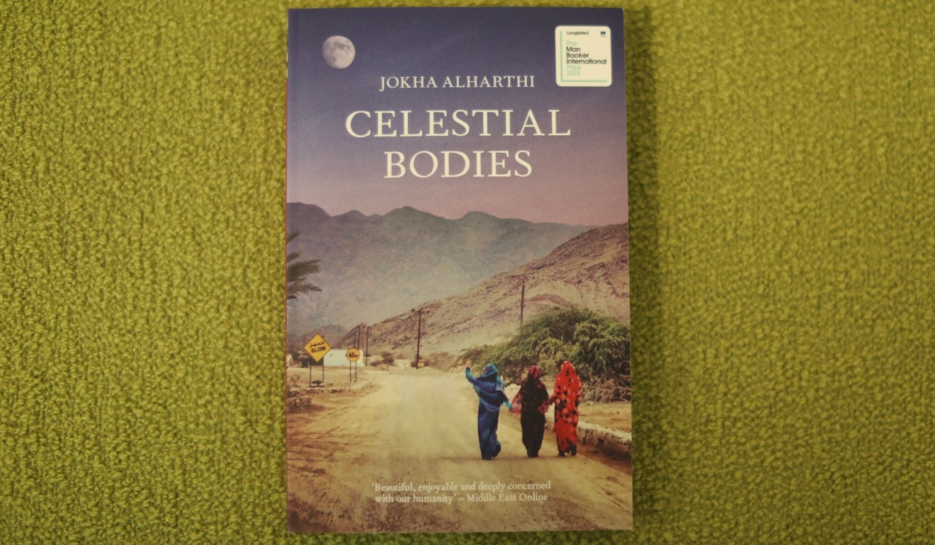 A copy of Celestial Bodies by Jokha Alharthi, translated by Marilyn Booth. Photo: AFP