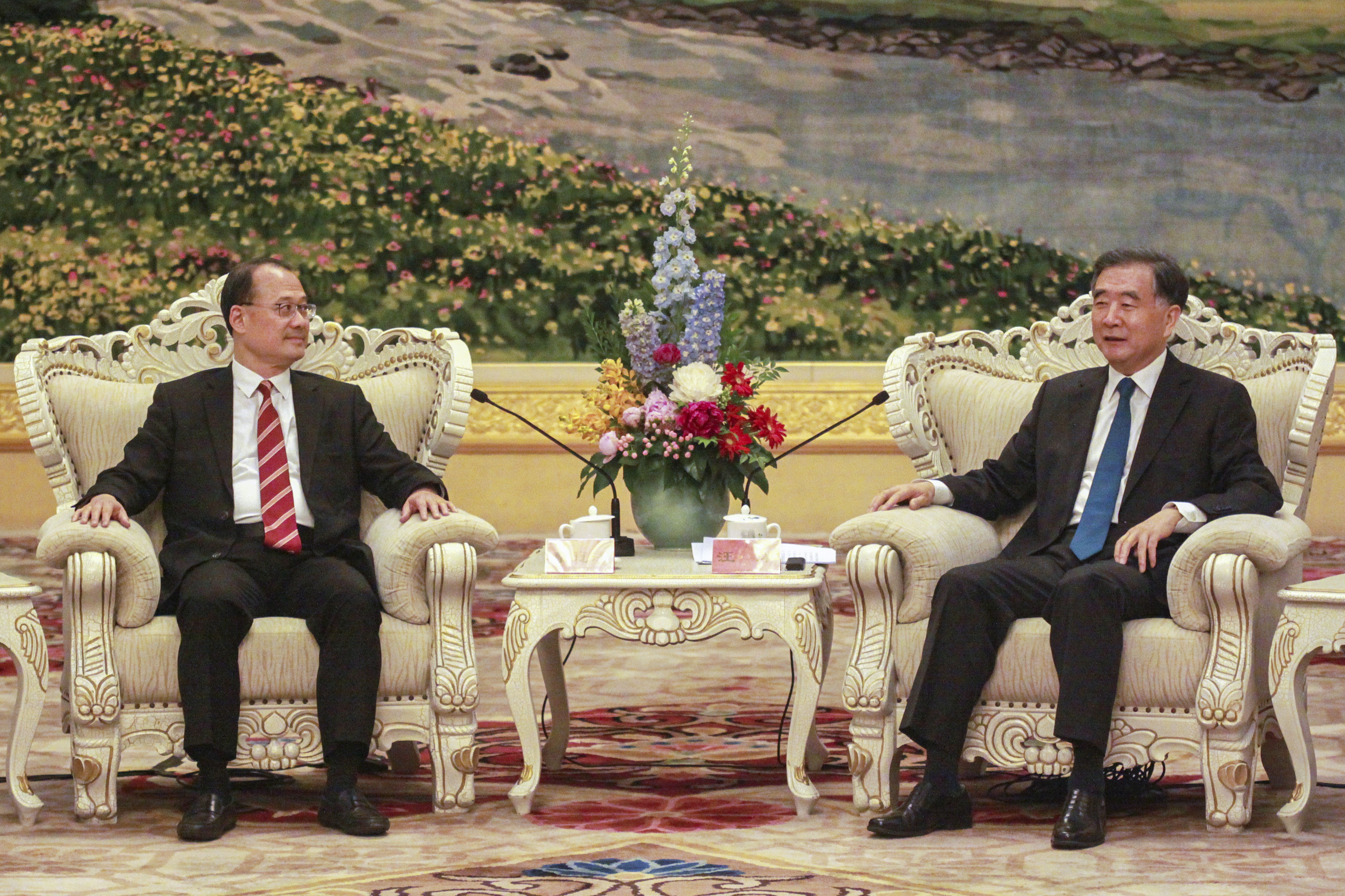 Jonathan Choi (left) with Wang Yang at the Great Hall of the People in Beijing. Photo: Handout