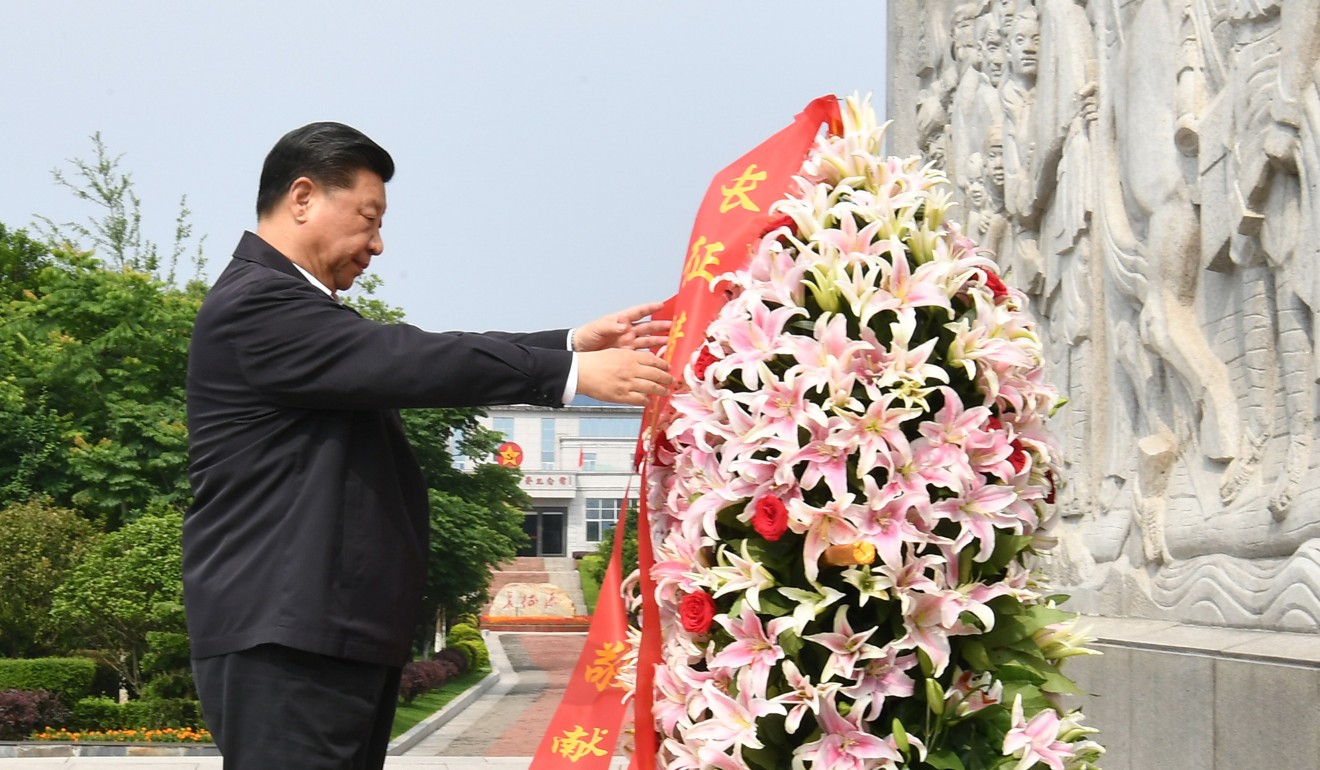 Chinese President Xi Jinping lays a floral tribute at a monument marking the start of the Long March in Yudu county, Jiangxi province, on Monday. Photo: Xinhua
