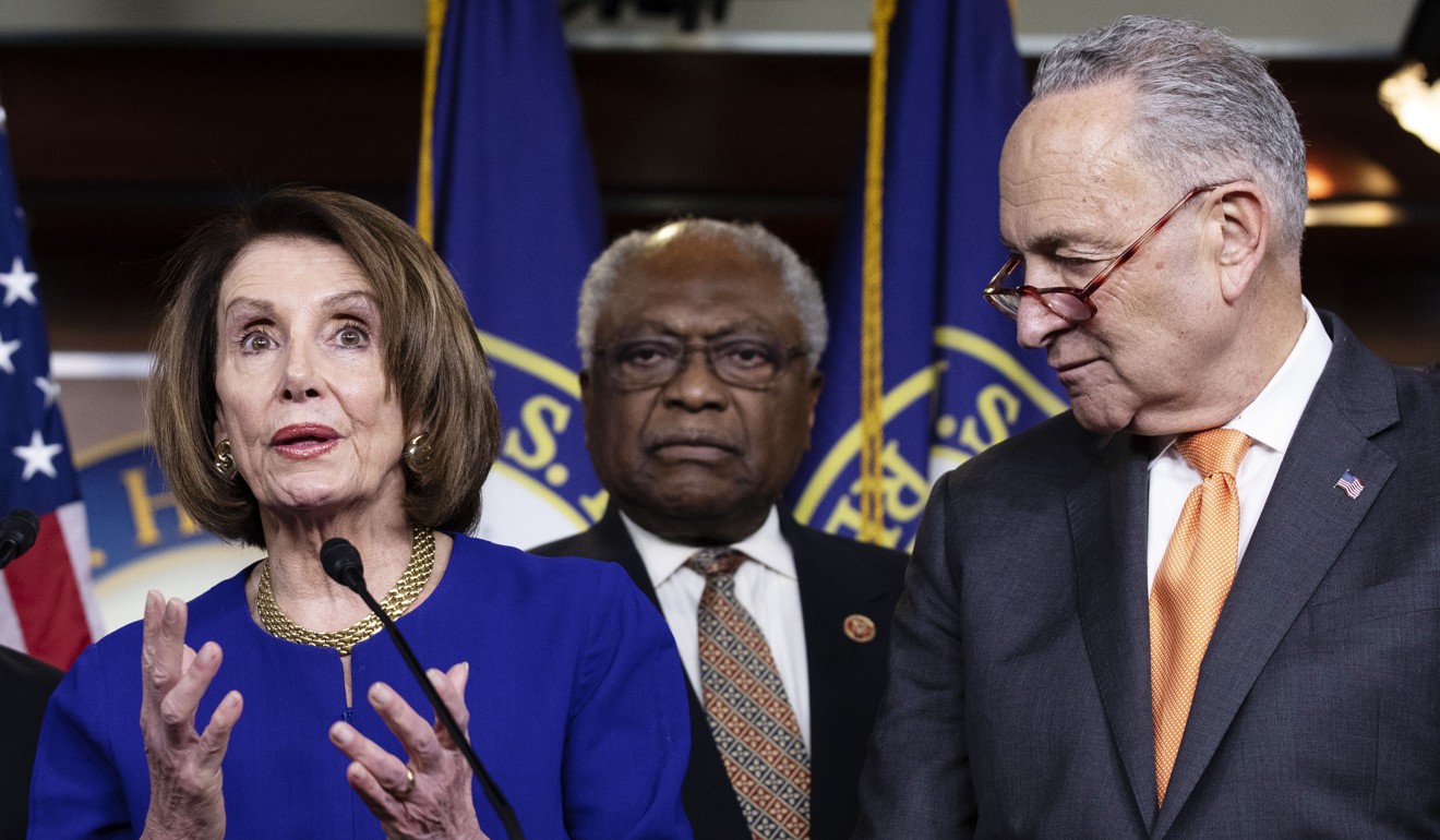 US House Speaker Nancy Pelosi speaks to the media while Representative James Clyburn (centre) and Senate Minority Leader Chuck Schumer listen after an abbreviated meeting with US President Donald Trump on Wednesday. Photo: Bloomberg
