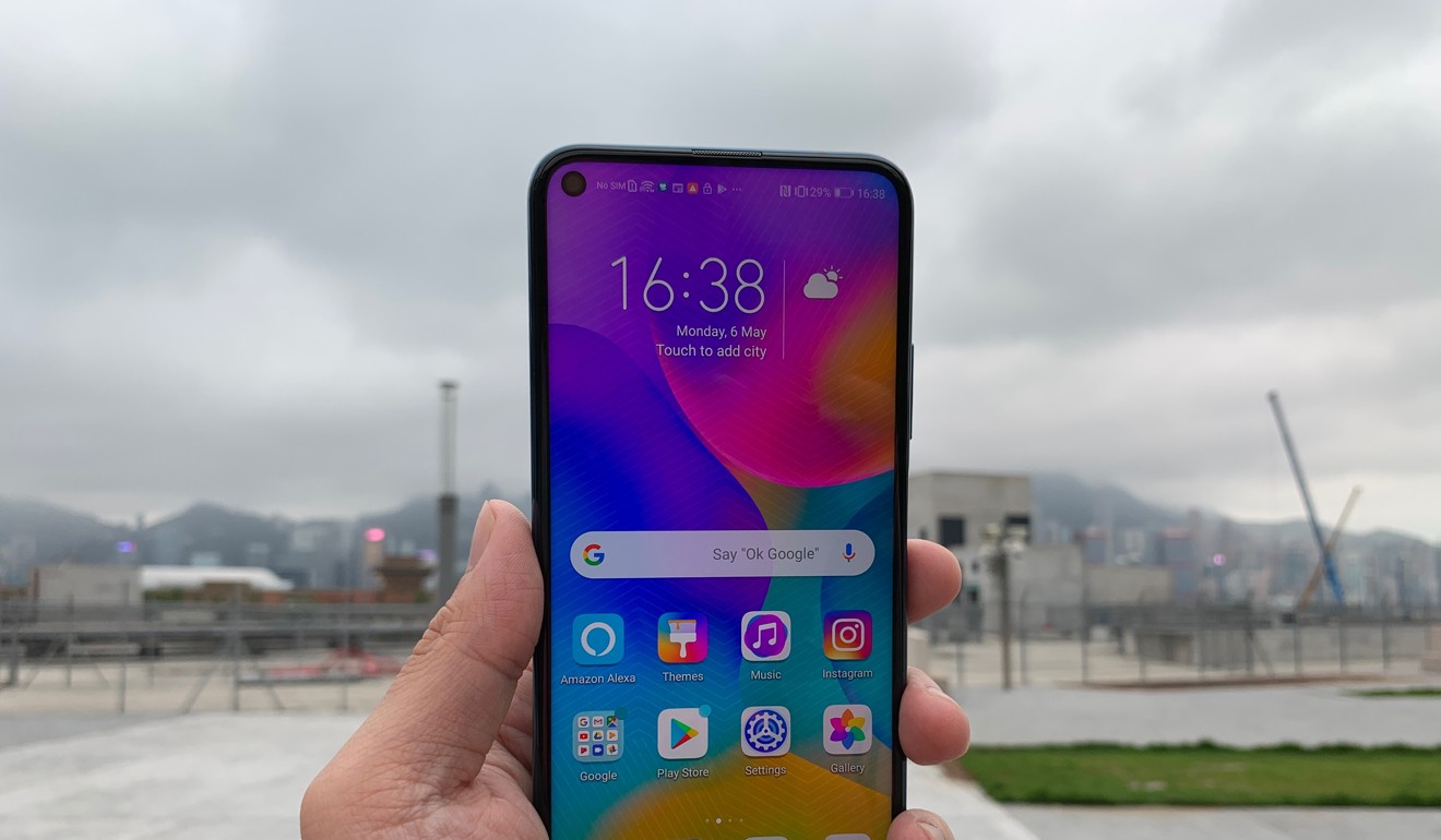 The Honor 20 Pro has a 6.3-inch screen with a hole drilled in the upper left corner to house a 32-megapixel selfie camera. The feel in the hand is similar to that of an Honor View 20. Photo: Ben Sin