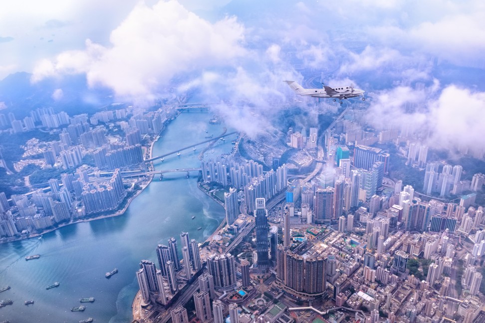 A private jet over Hong Kong. Photo: Alamy