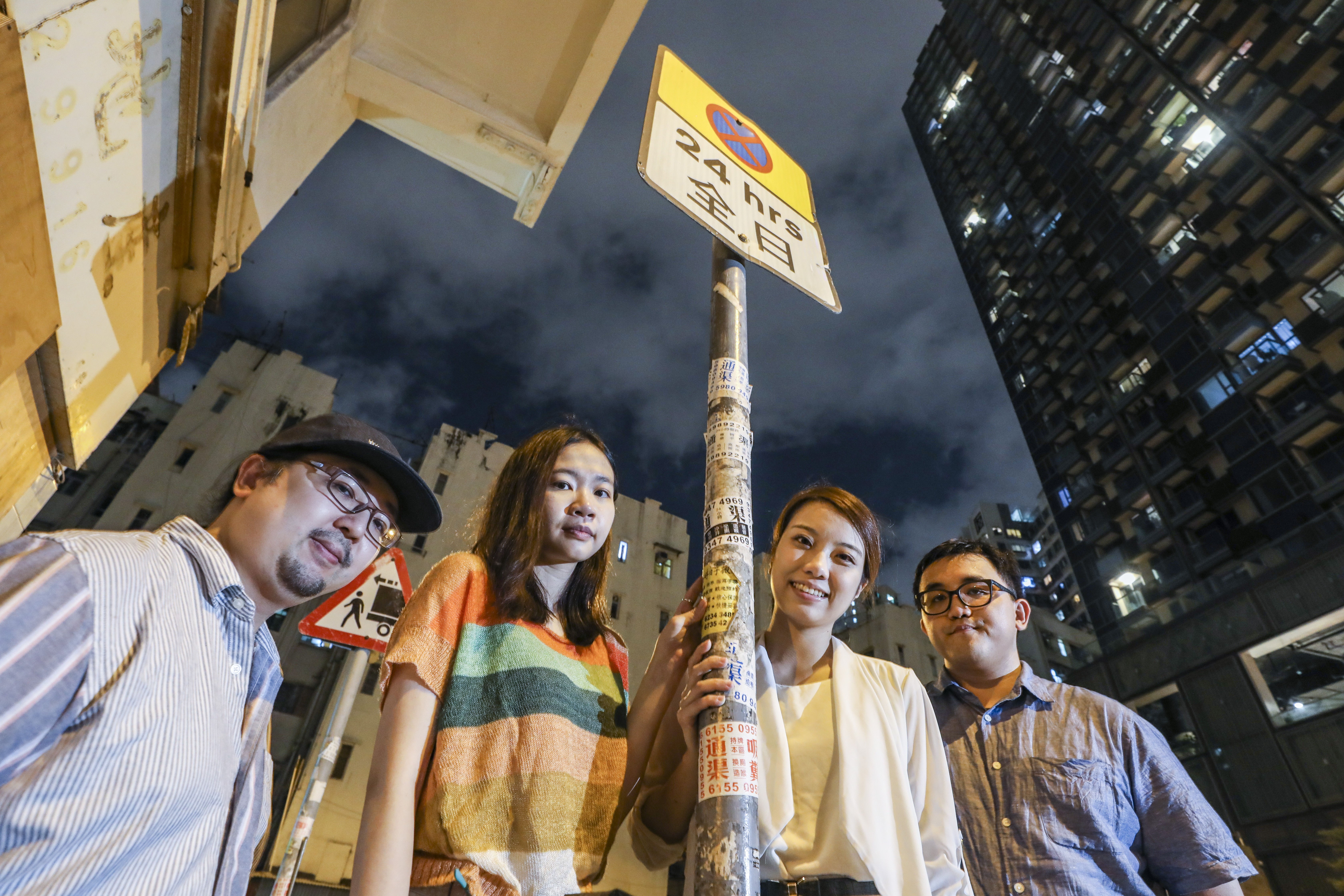 (From left) Cliffy, Mimosa Ho, Big Big Grey Bear and Adri, members of Team Error, the group behind online site Roadsign. Photo: Dickson Lee