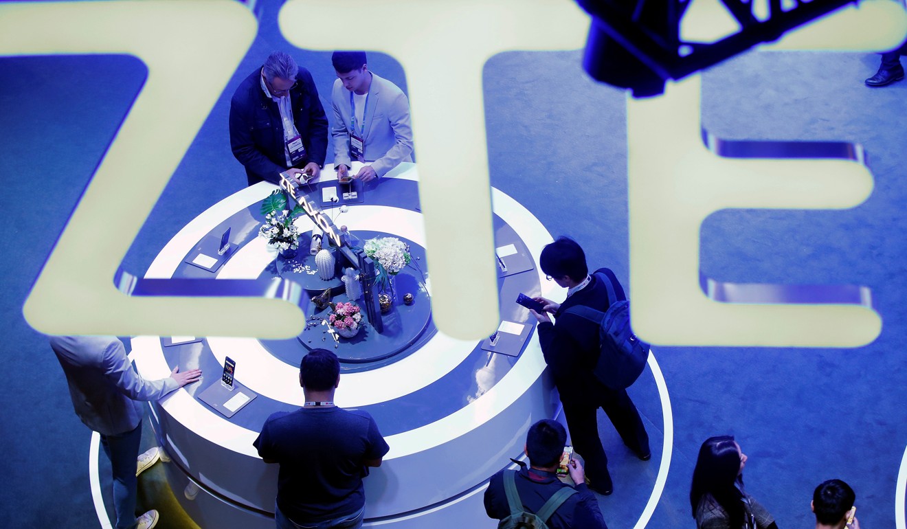 Visitorsat the ZTE stand during the Mobile World Congress in February. Photo: EPA-EFE