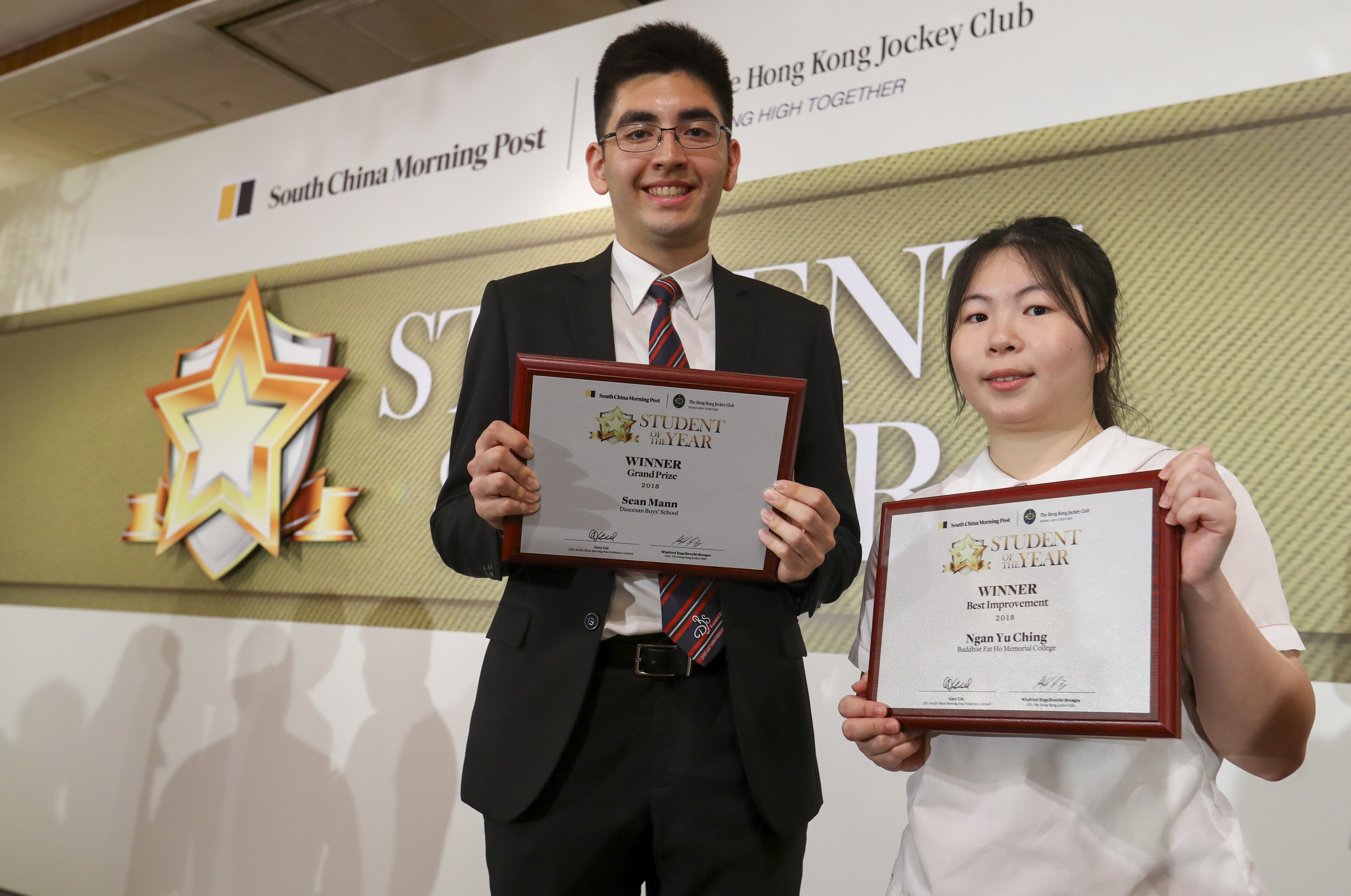 Sean Mann (L), the Student of the Year Grand Prize winner, and Ngan Yu-ching, winner of the Best Improvement category on Saturday. Photo: Edmond So