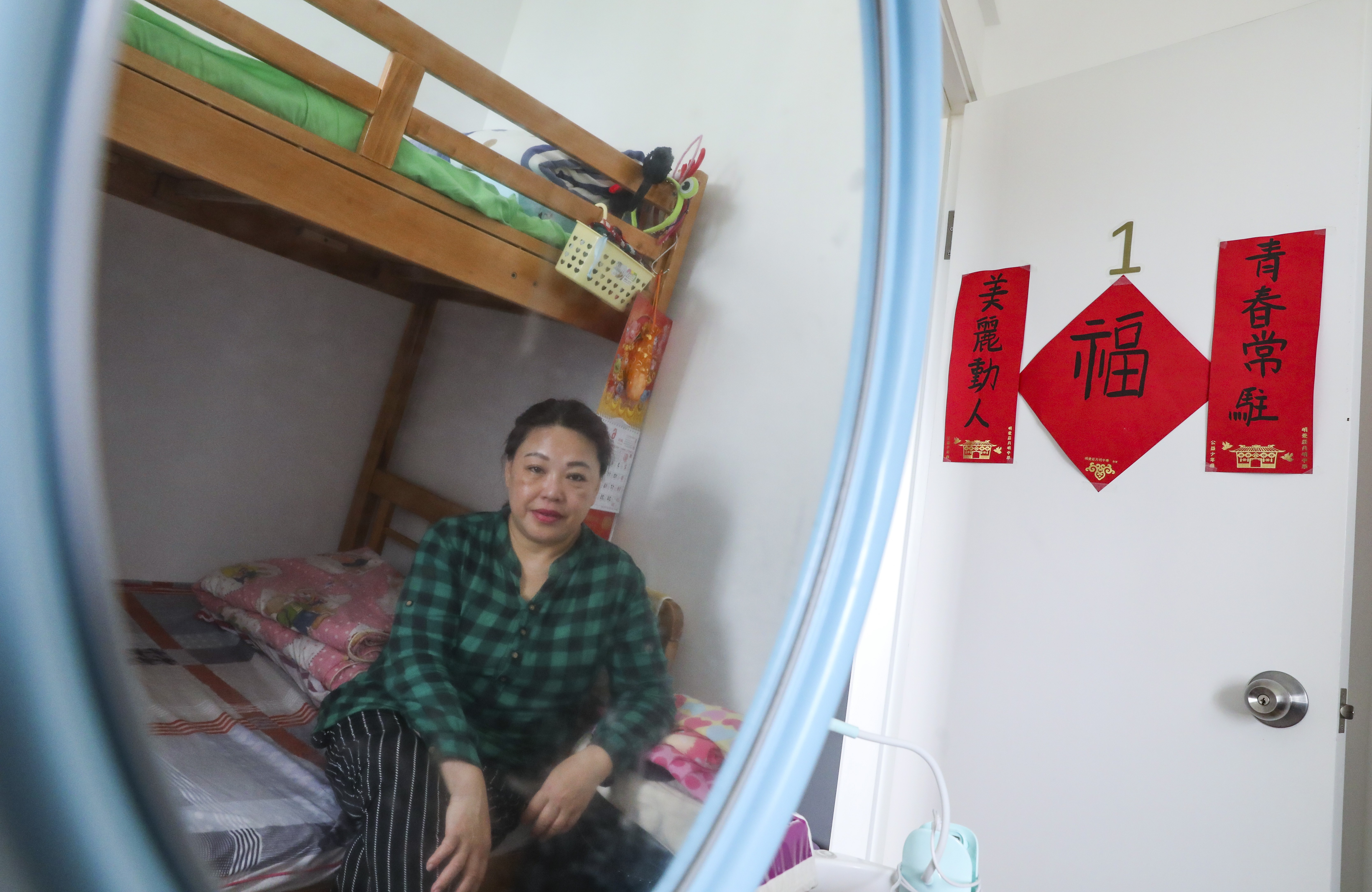 Wu Xiaoping, 51, a single mother who lives with her 18-year-old daughter in community housing. Photo: Nora Tam
