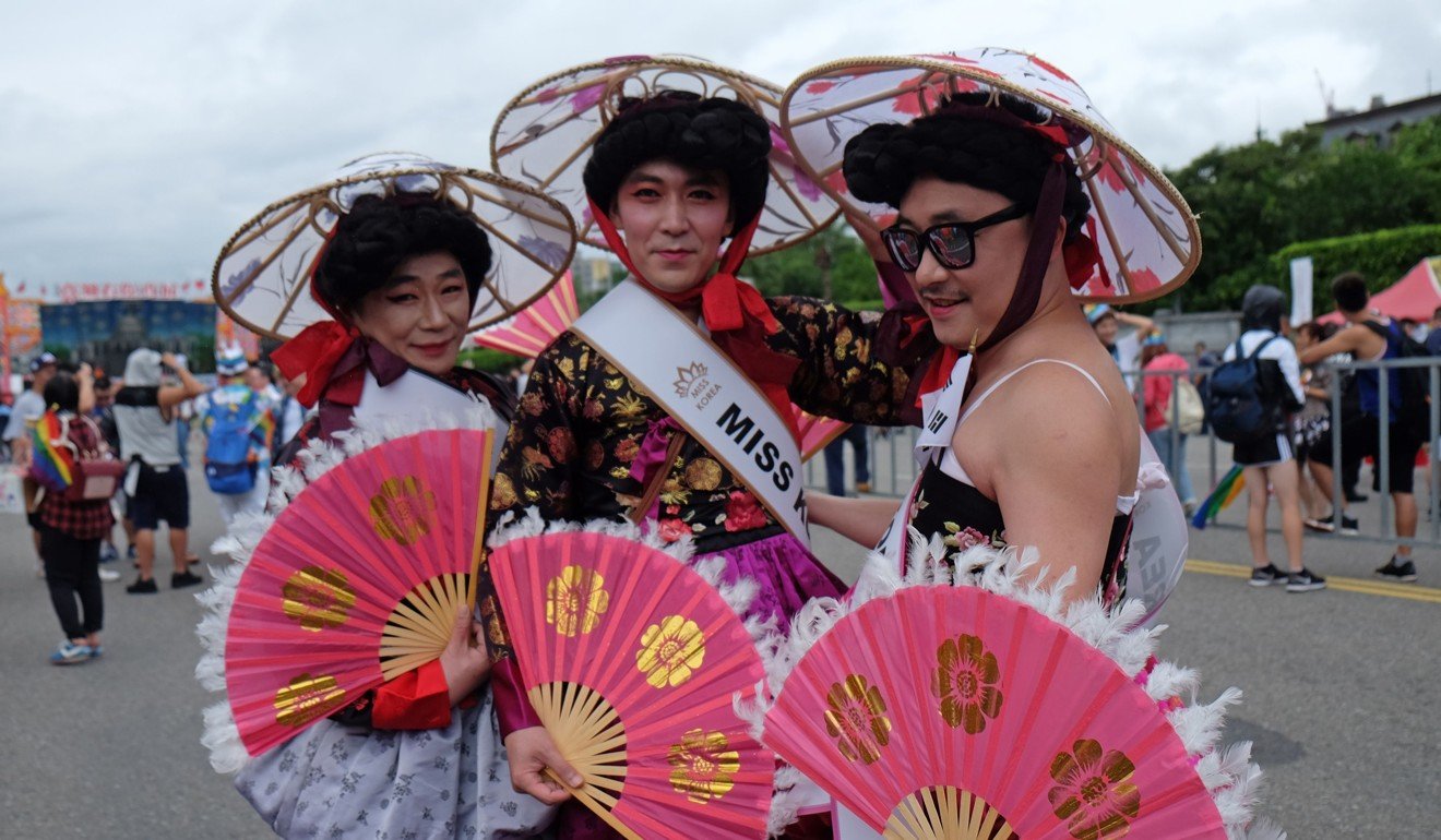 South Korean men take part in Taiwan’s annual LGBT pride parade in Taipei. Photo: AFP