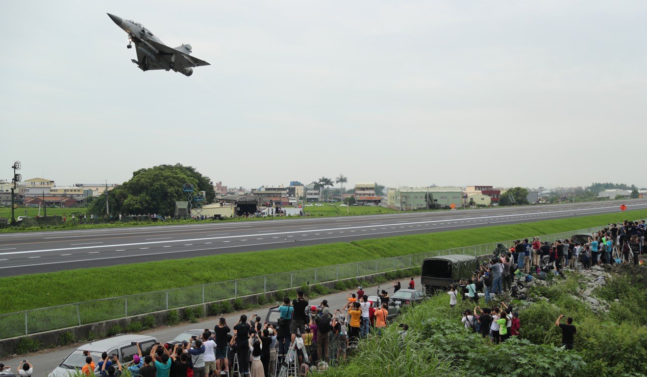 A Mirage 2000-5 fighter jet takes off from a highway during an emergency take-off and landing drill in Changhua, Taiwan. Photo: EPA