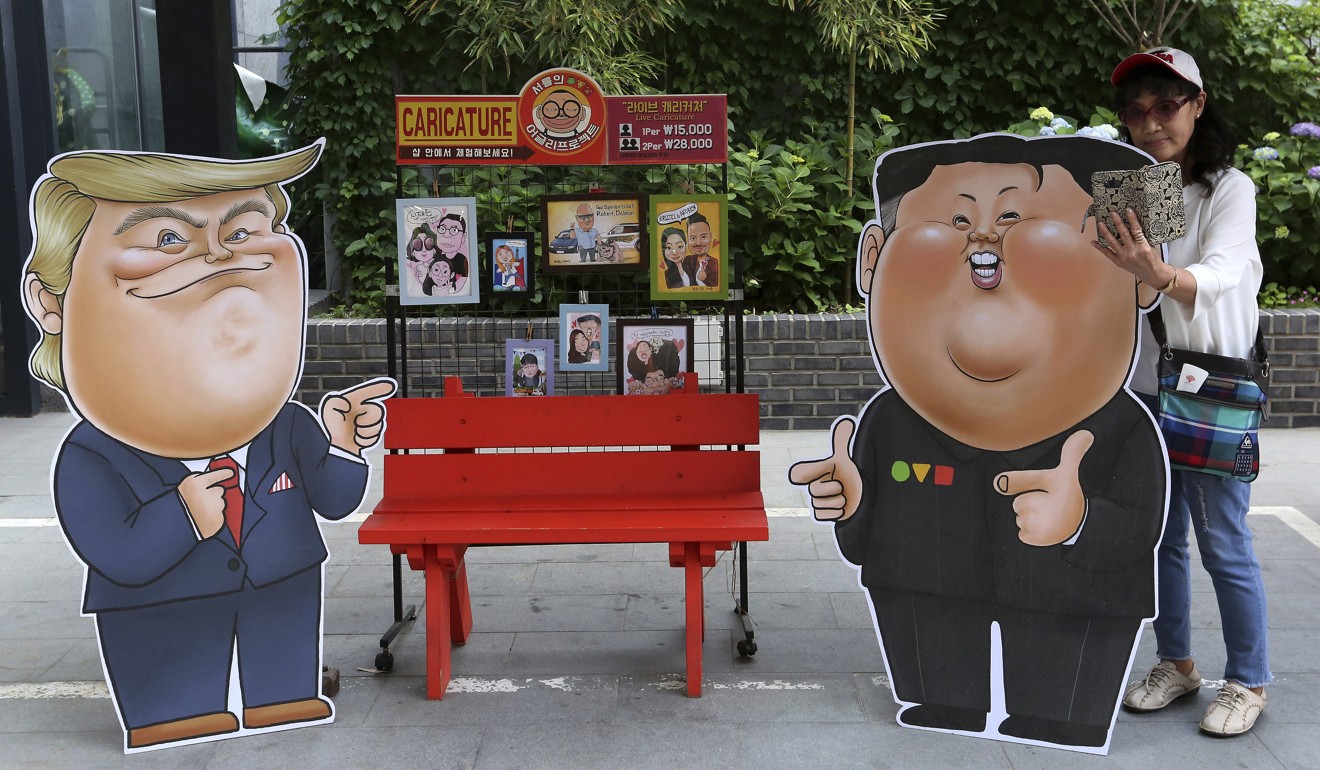 Caricatures depicting US President Donald Trump and North Korean leader Kim Jong-un on display in Seoul on Sunday. Photo: AP