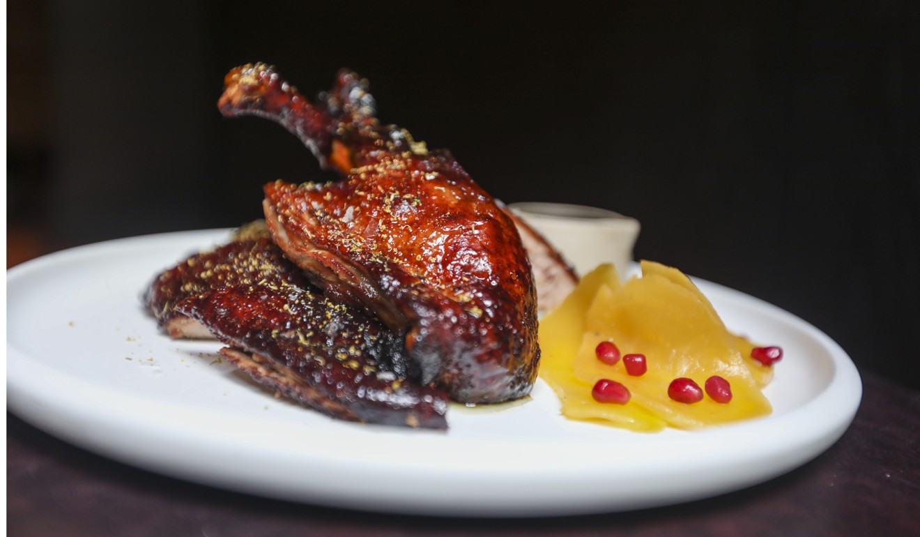 Half duck with golden beets and pomegranate. Photo: Xiaomei Chen