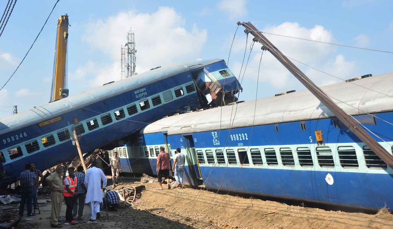 The aftermath of a crash in which an express train derailed near the town of Khatauli in the Indian state of Uttar Pradesh, on August 20, 2017, killing 23 people. Photo: AFP