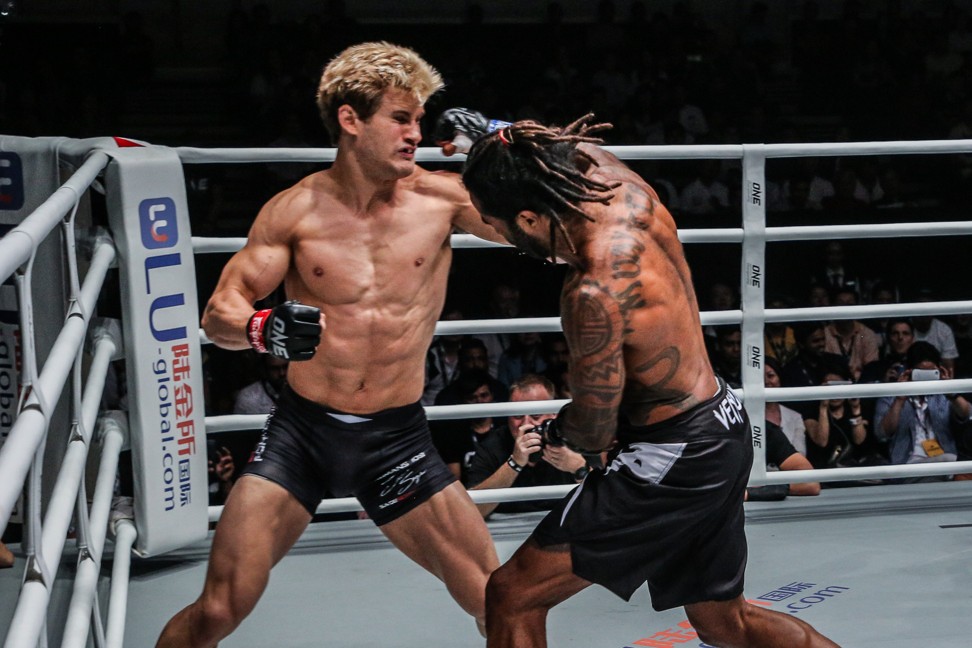 Cosmo Alexandre winds up an overhand against Sage Northcutt. Photo: One Championship