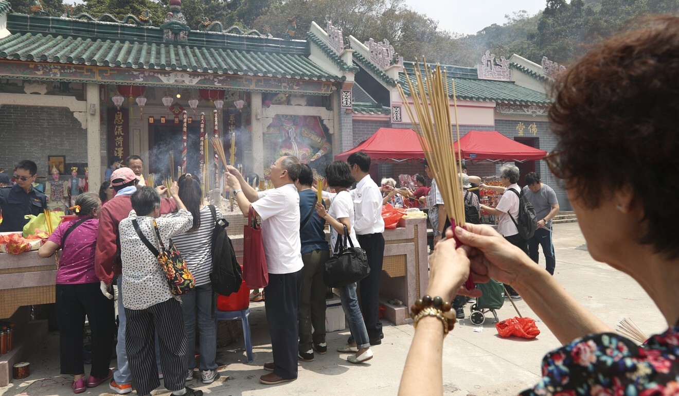 Worshippers gather at Tin Hau Temple in Fat Tong Mun, Hong Kong. Photo: Nora Tam