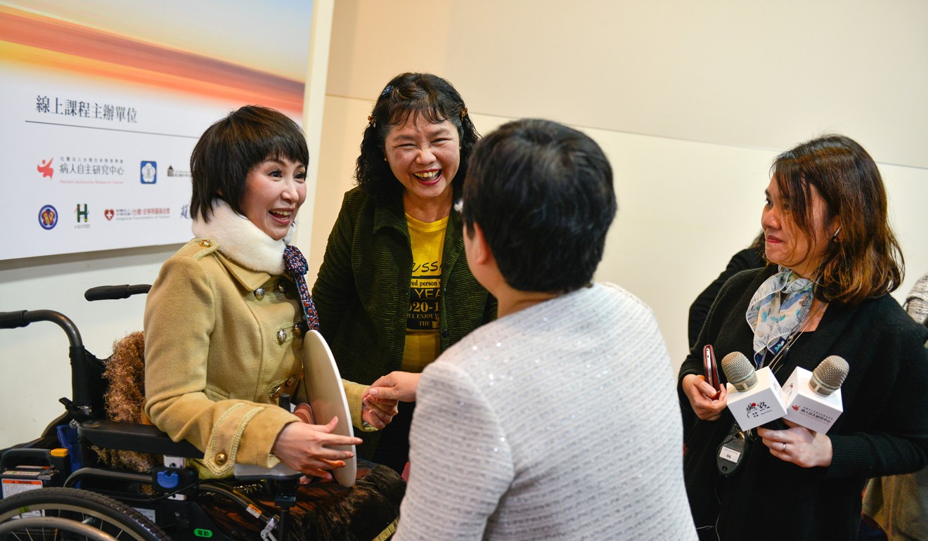Rose Yang greets friends during a press conference in January about the coming into effect of Taiwan’s Patient Autonomy Law, which she championed while a legislator. Photo: Chris Stowers