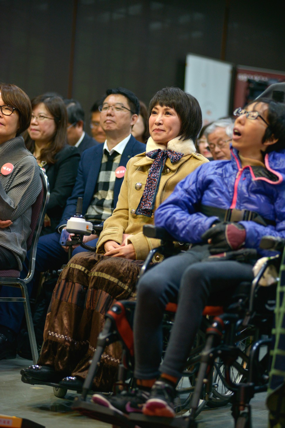 Yang listens to a speaker at a press conference held in January to mark the coming into effect of Taiwan’s Patient Autonomy Law. As a legislator, she secured unanimous support for its passage. Photo: Chris Stowers