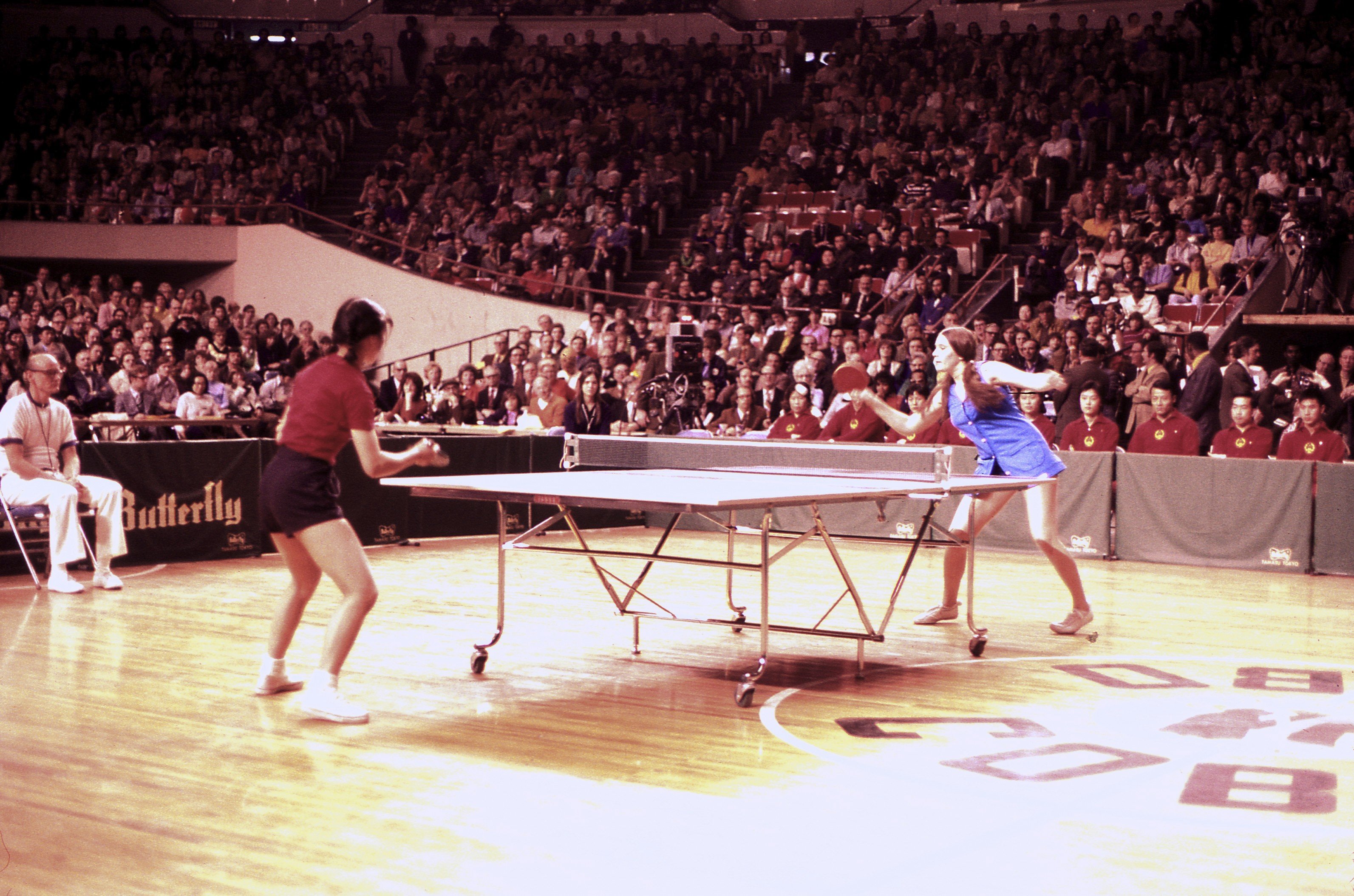 American Judy Bochenski plays a match against a member of the visiting Chinese table tennis team, in Cobo Hall, Detroit, in 1972. Photo: courtesy of Judy Hoarfrost