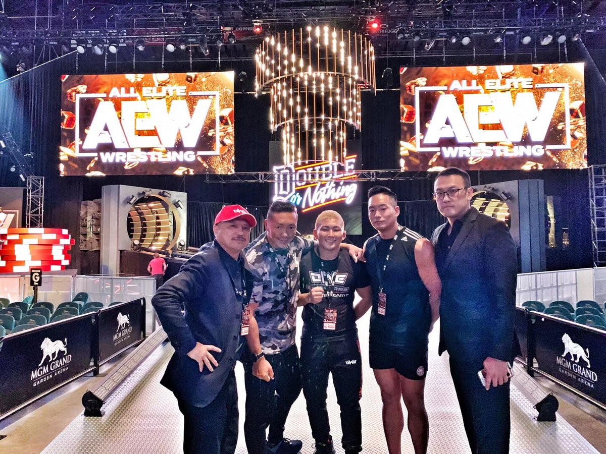 Michael Nee (right) with OWE’s Japanese wrestlers ahead of their match at AEW’s Double or Nothing. Photo: OWE