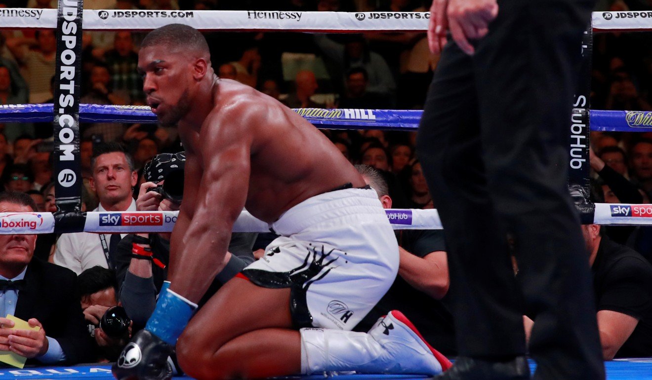 Anthony Joshua is given the count. Photo: Reuters