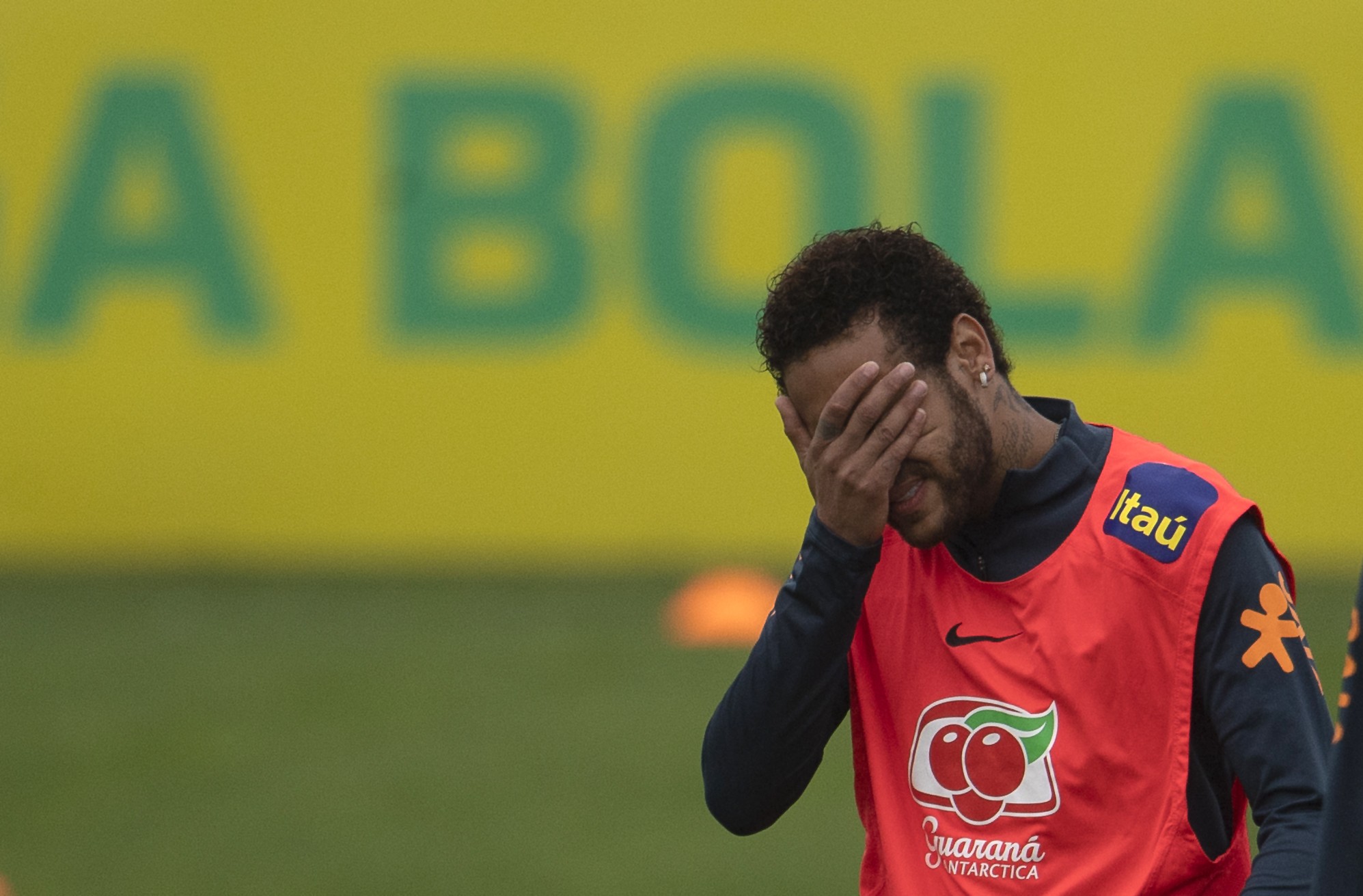 Brazil and Paris St Germain star covers his eyes during training at the Granja Comary sport complex in Teresopolis, Brazil. Photo: AFP