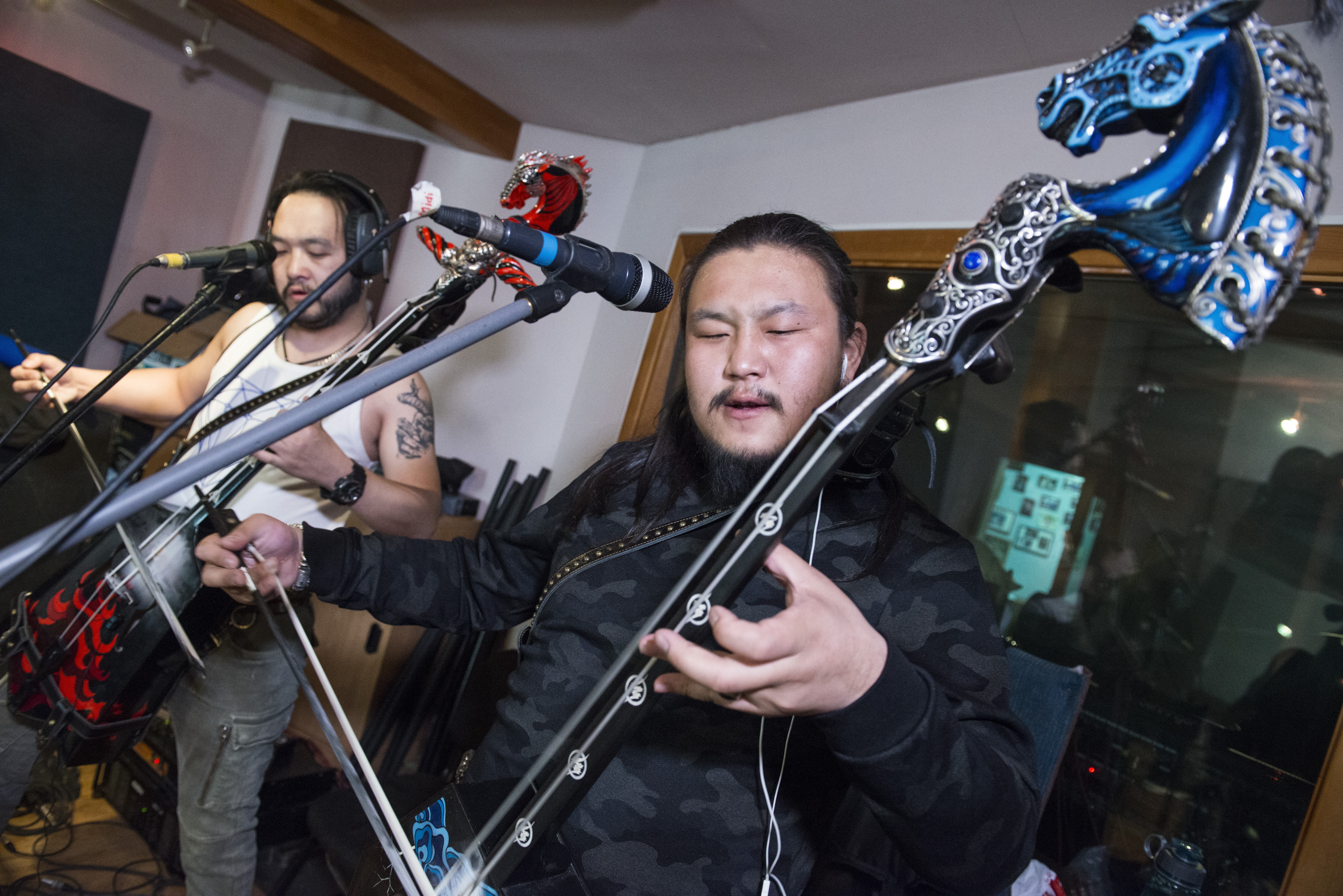 Enkhush and Gala play the morin khuur during a rehearsal in The Hu's studio. Photo: Zigor Aldama