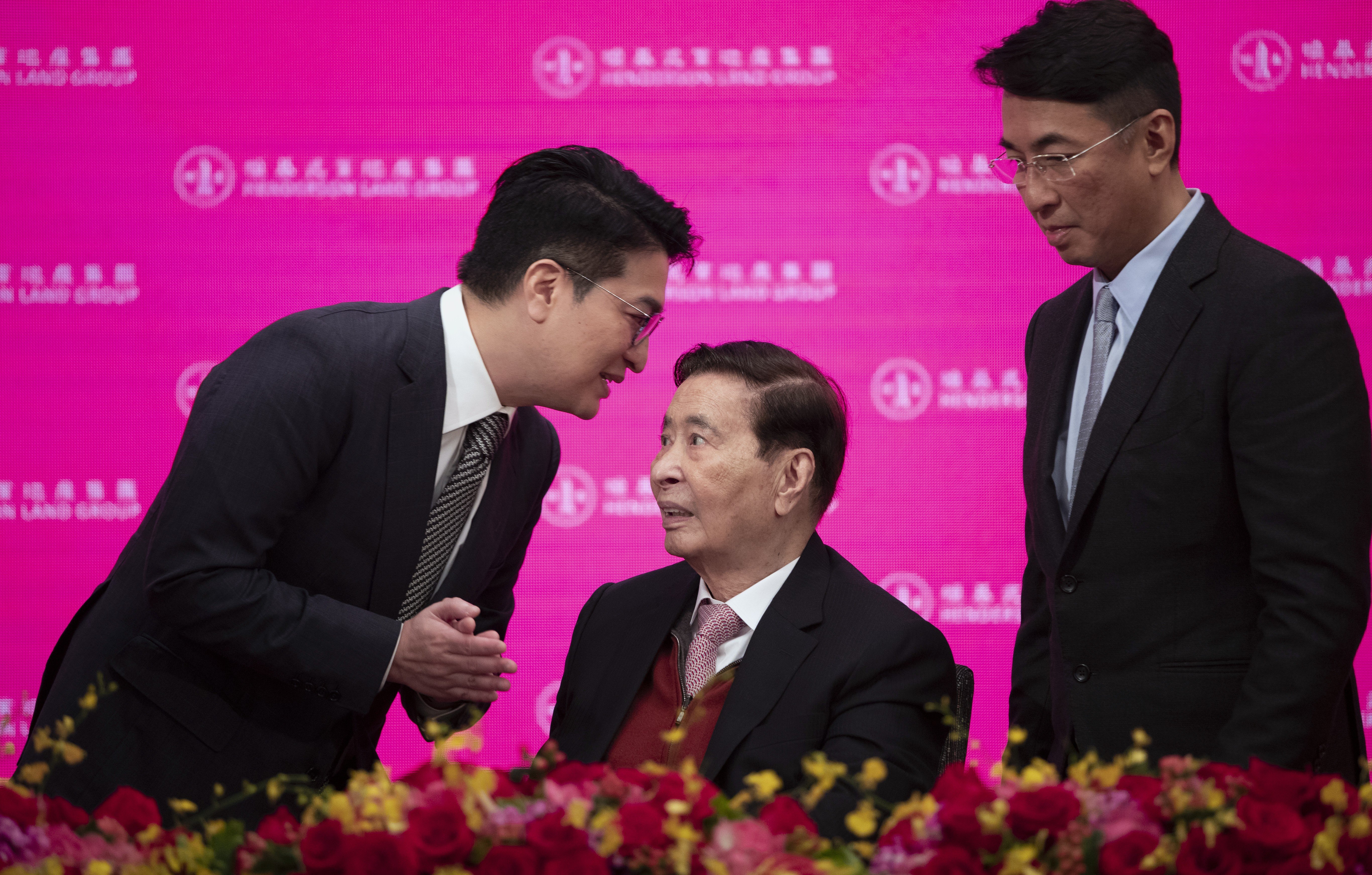 Among the new generation of property tycoons are Martin Lee Ka-shing (left) and his brother Peter Lee Ka-kit, seen with their father Lee Shau-kee, seated, at Henderson Land Development’s annual general meeting on May 28. Photo: Robert Ng