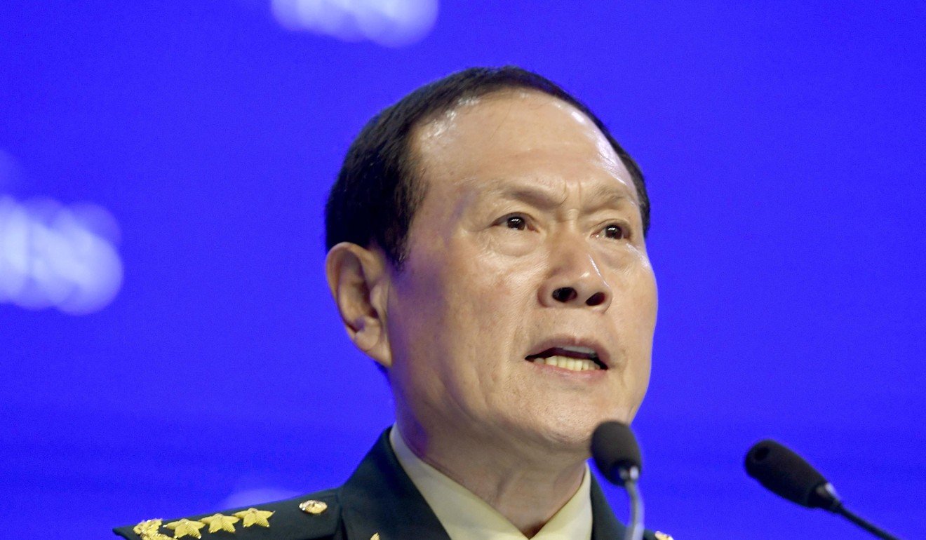 Chinese Defence Minister General Wei Fenghe addresses the Asia Security Summit in Singapore, known as the Shangri-La Dialogue, on Sunday. Photo: Kyodo