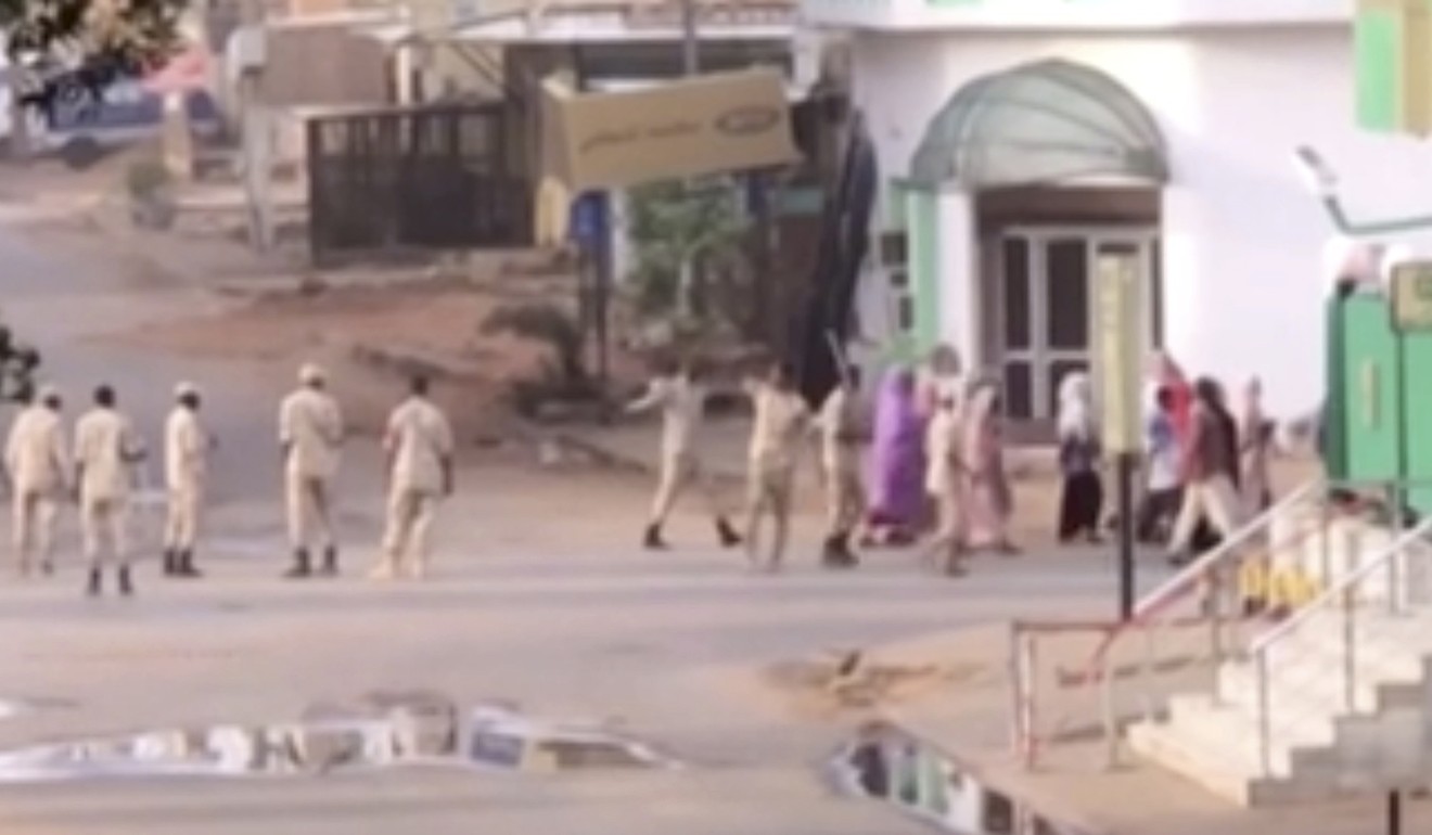 Sudanese forces escort civilians in Khartoum. Photo: AP