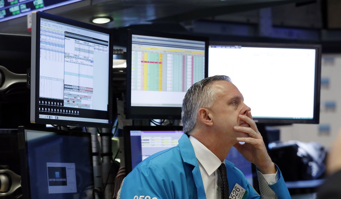 A trading specialist works on the floor of the New York Stock Exchange in March 2019. Trump has made the soaring stock market a barometer of his presidency. Photo: AP