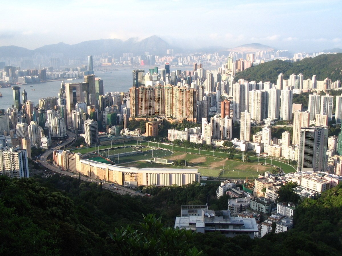 Happy Valley Racecourse is open daily from 5am to midnight for public use of the 1.3km paved track for running and walking – except on racing days. Photo: Minghong/Wikicommons