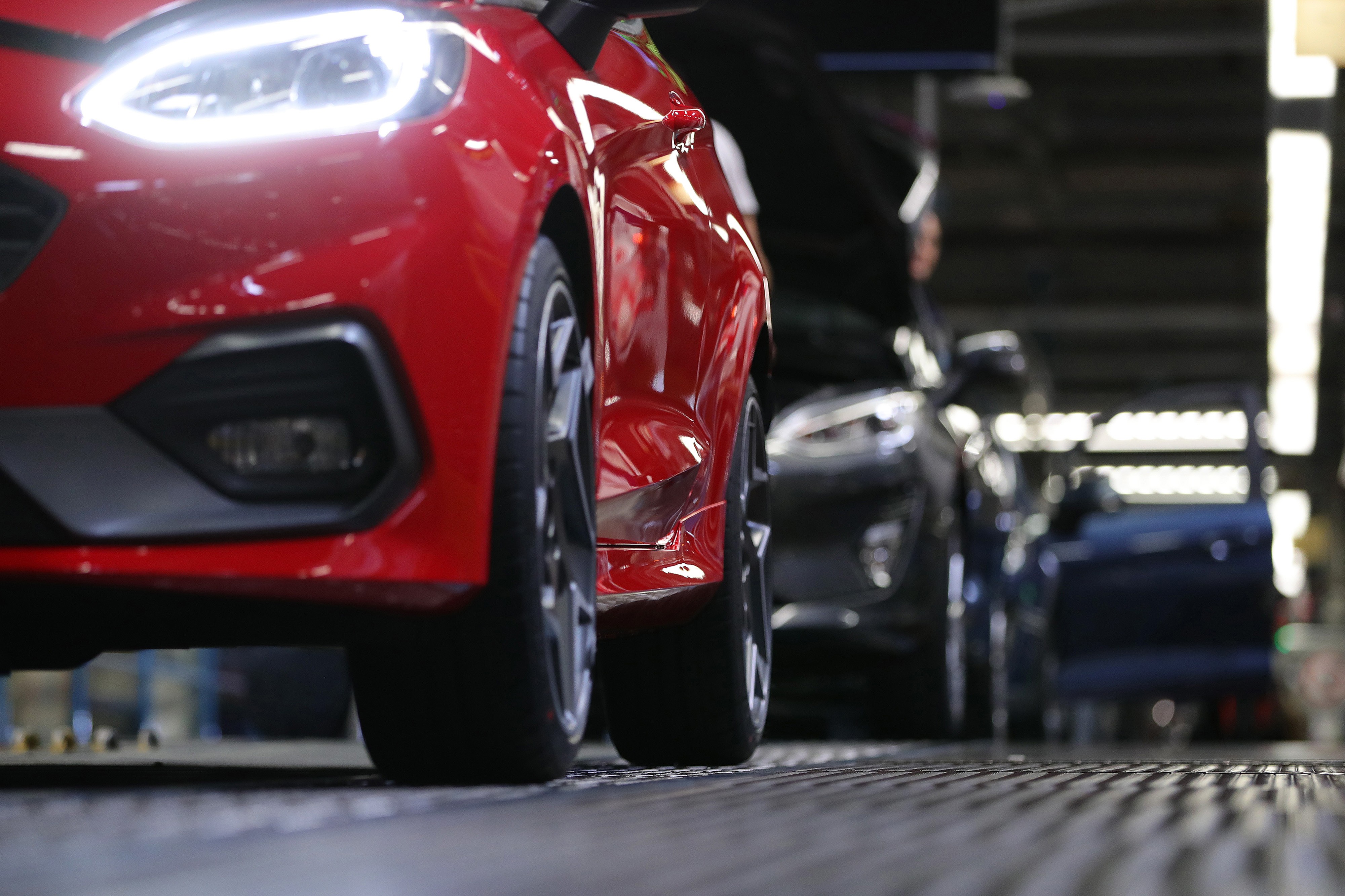 New Ford Fiesta cars roll off the assembly line at the Ford Motor Company factory in Cologne, Germany, on February 13. Photo: Bloomberg