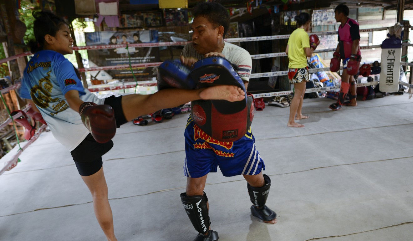 The Yoohanngoh family remain major advocates of child kick-boxing. Photo: Anusak Laowilas