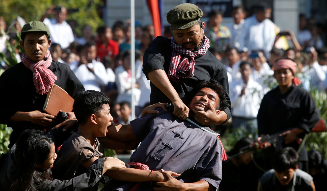 Actors during the annual “Day of Anger” in Cambodia, on which people gather to remember those who perished during the Khmer Rouge regime. Photo: Reuters