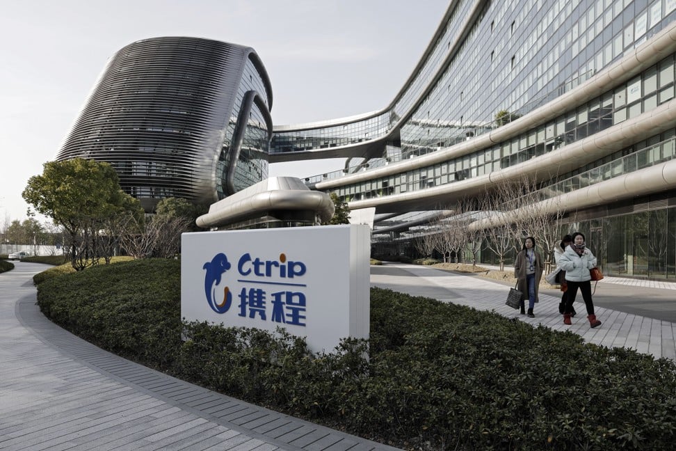 A sign for Ctrip is displayed outside the Sky Soho building, which hosts the company's headquarters, in Shanghai on Monday, January 23, 2017. Ctrip is the world's No. 2 online agency by market value. Photo: Bloomberg