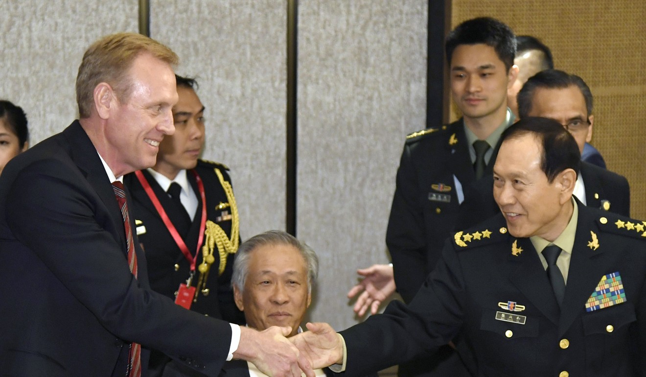Acting US defence secretary Patrick Shanahan (left) and China’s Defence Minister General Wei Fenghe meet at the Shangri-La Dialogue. Photo: Kyodo