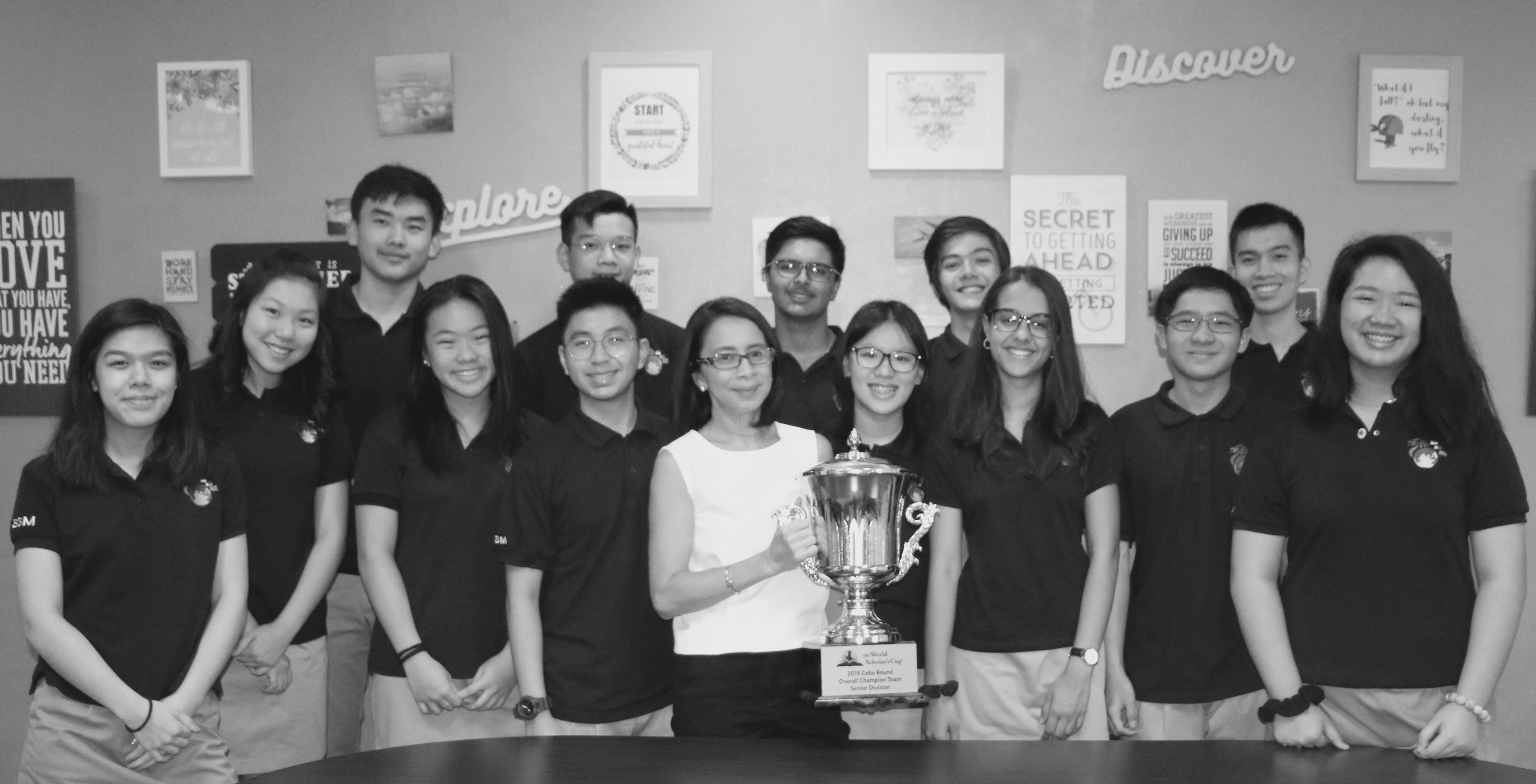 Singapore School Manila managing director Analei Atienza with students