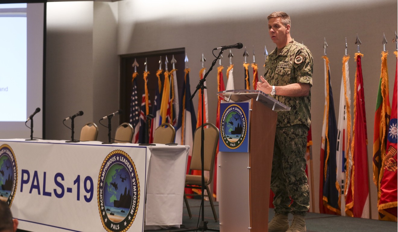 Admiral Phil Davidson addresses the symposium on June 4, with the flag of Taiwan’s Marines Corps in the background (right). Photo: US Marine Corps Forces, Pacific