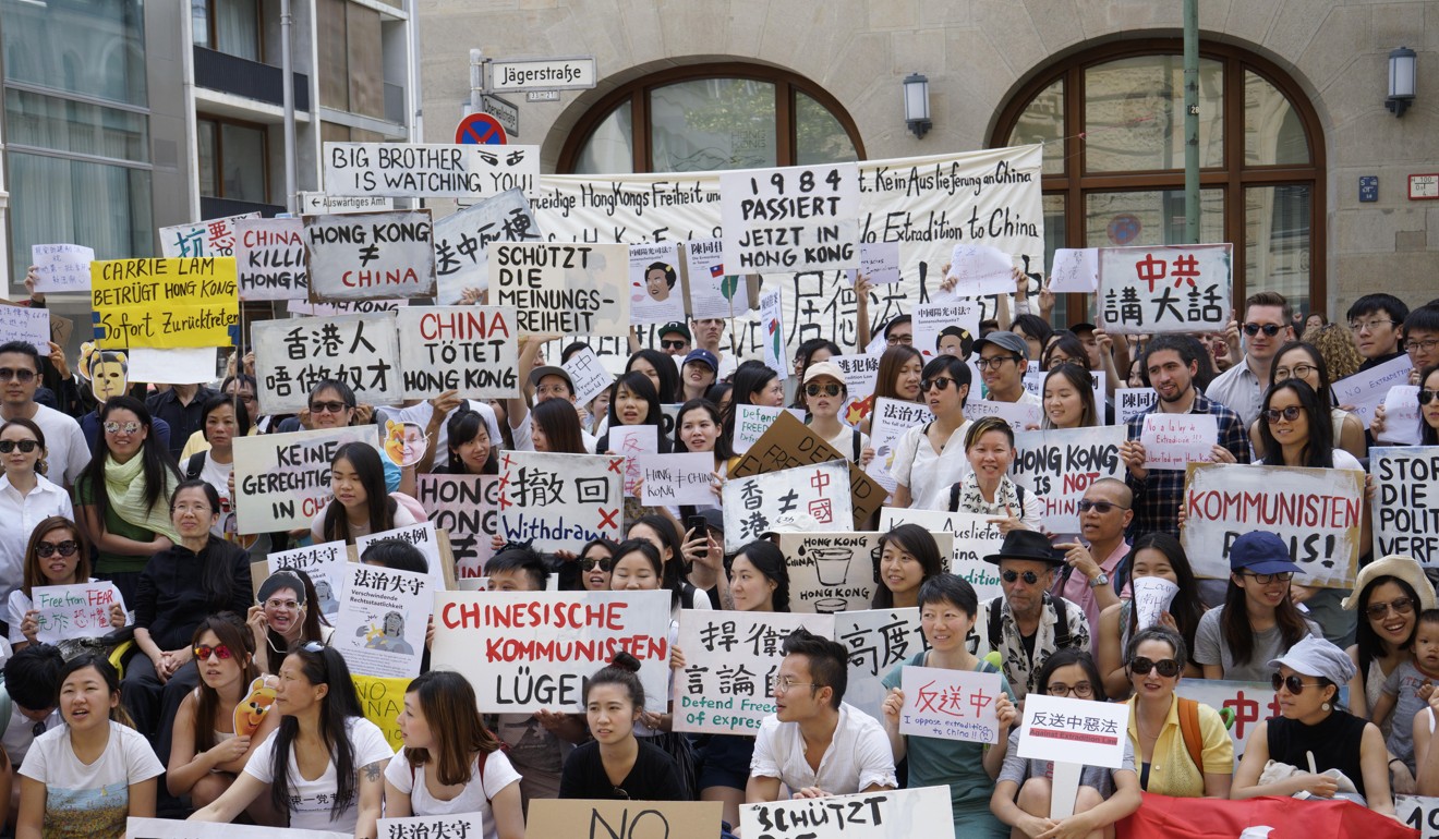 Protesters gathered outside the Hong Kong Economic and Trade Office in Berlin on Sunday. Photo: SCMP/ STR/ Cherie Chan