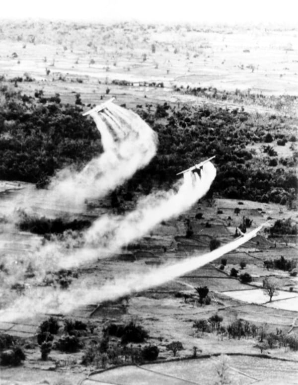 US military planes release Agent Orange over the Vietnam countryside as part of Operation Ranch Hand. Photo: UPI