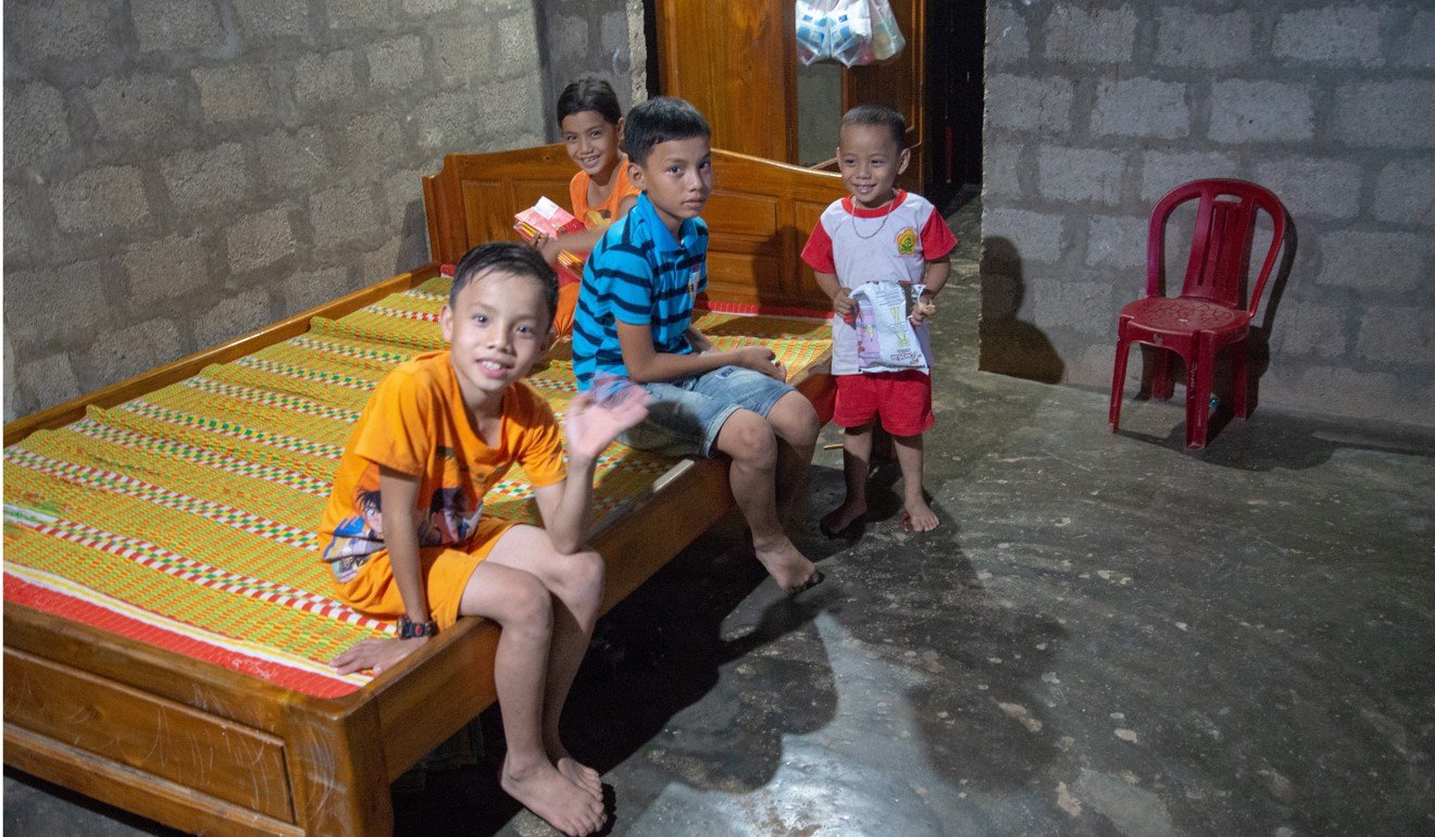 From left: Mai Cong Khoa, eight, who is deaf; Mai Kim Chi, seven, a healthy girl; Mai Cong Truyen, 11, another deaf child; and Mai Cong Tun, four, also deaf. Photo: Khairul Anwar