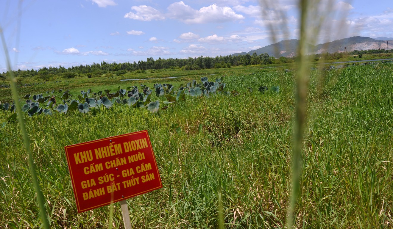 A warning sign that says ‘dioxin-contaminated area’ is seen near Da Nang airport. Photo: AFP