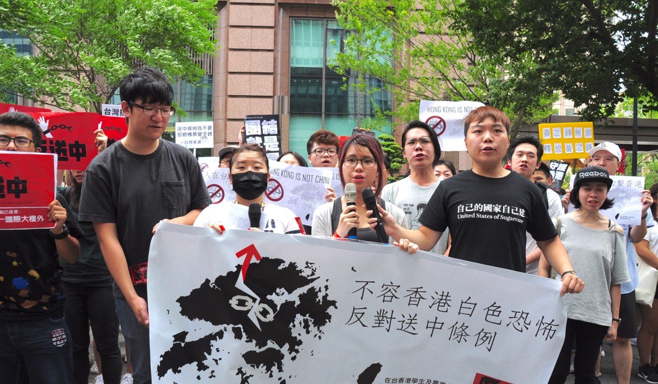 A rally at the Hong Kong Economic and Trade Office in Taiwan on Sunday drew more than 100 people. Photo: CNA