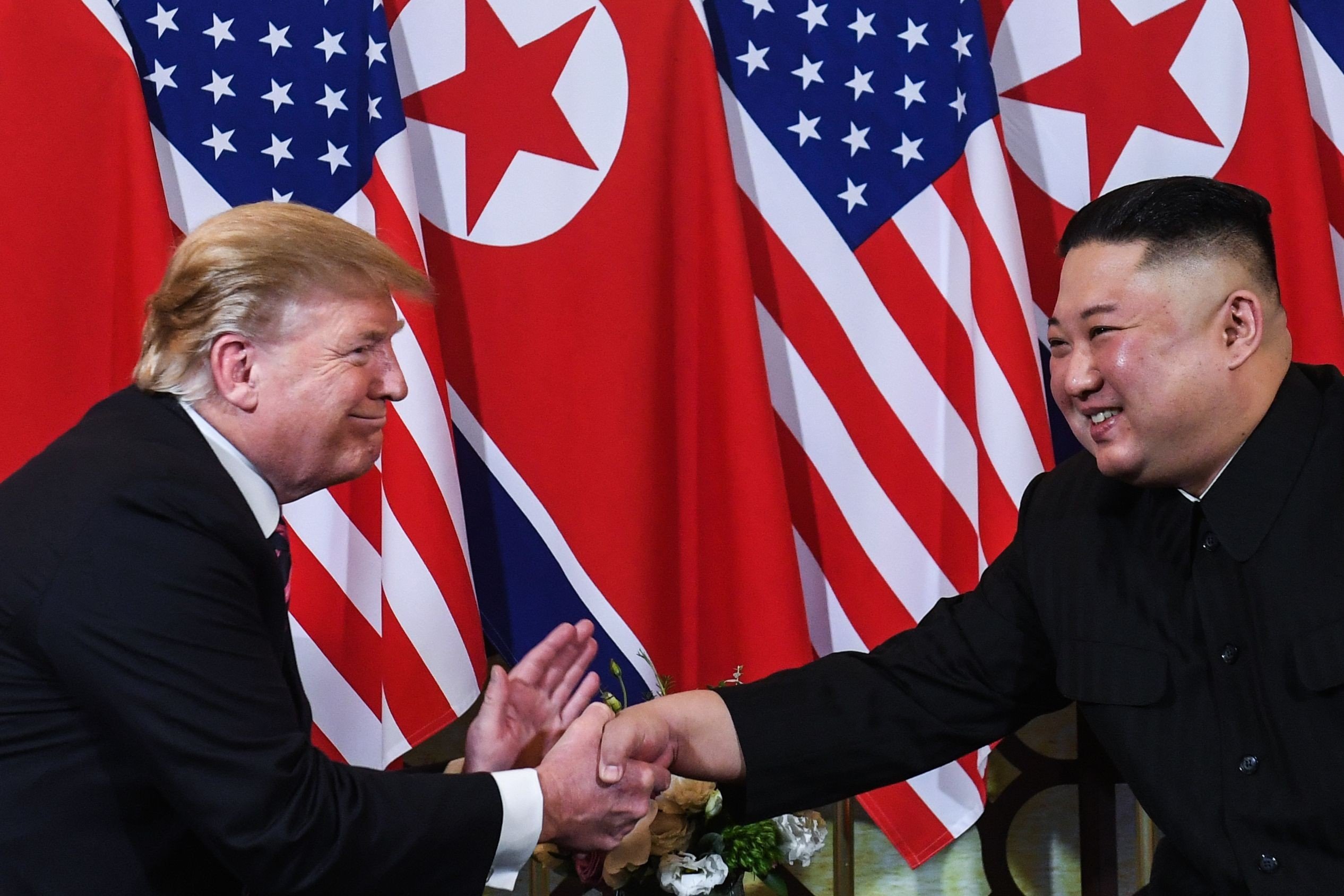 US President Donald Trump and North Korean leader Kim Jong-un shake hands following a meeting in Hanoi, Vietnam, on February 27, 2019. Since then, North Korea has undertaken missile tests and Trump has voiced confidence that Kim will not “break his promise”. Photo: AFP