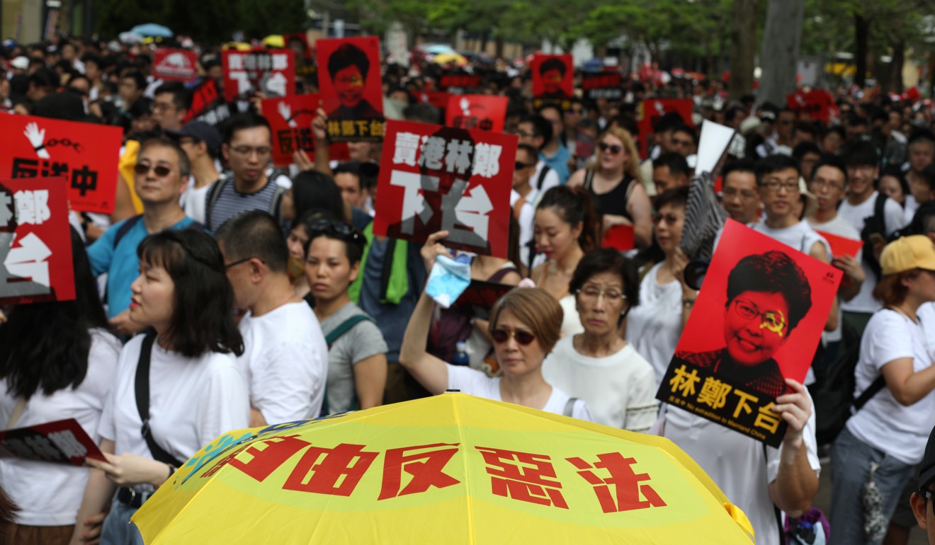 Protesters march against the extradition bill on Sunday. Photo: Xiaomei Chen