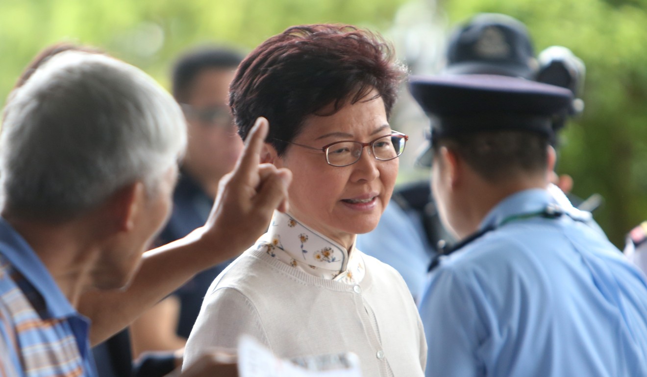 Chief Executive Carrie Lam meets petitioners before the Executive Council meeting in Tamar on Tuesday. Photo: Winson Wong