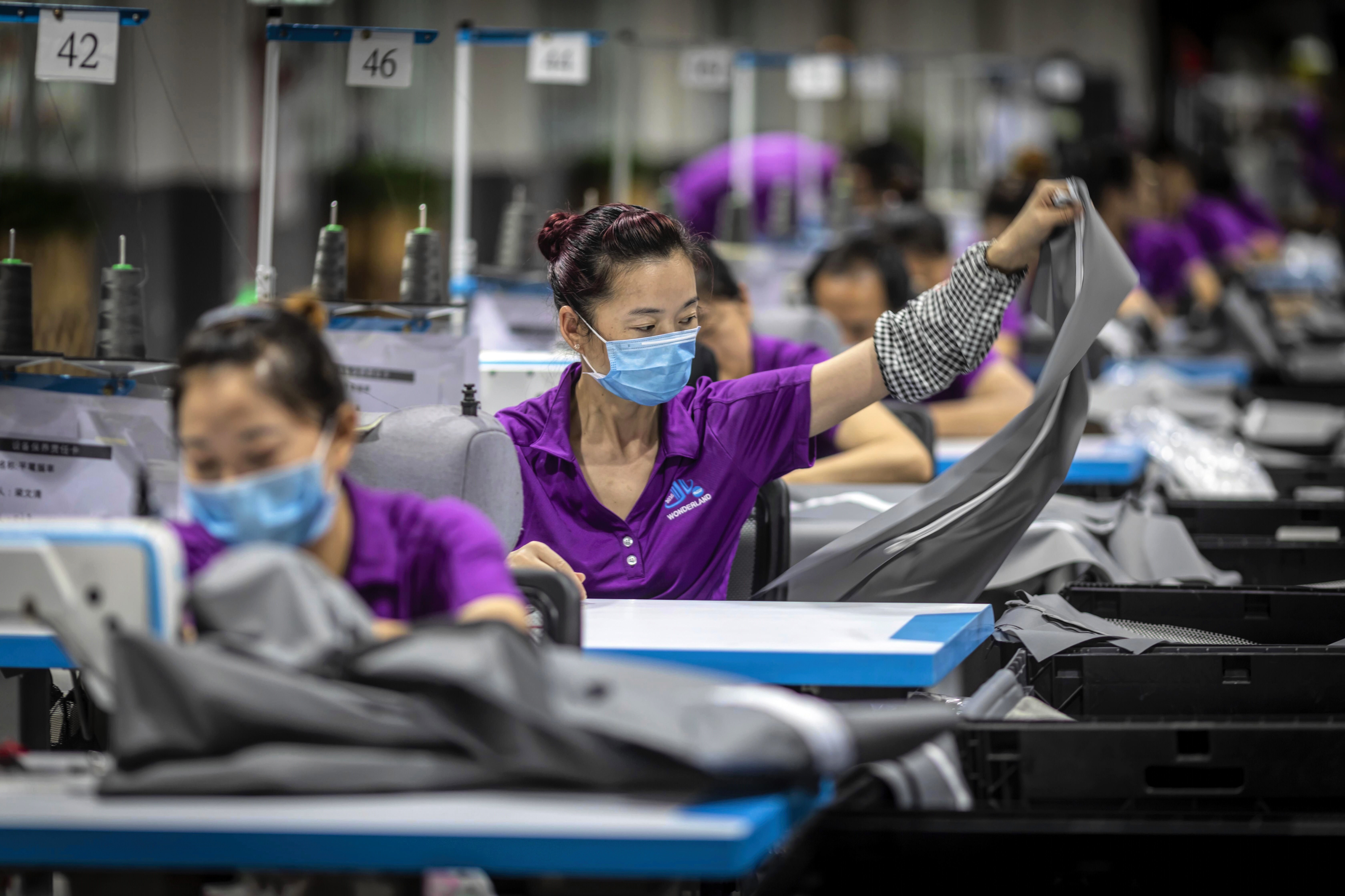 Often referred to as ‘factory to the world’, Dongguan was once China’s biggest export hub, the origin of cheap toys and clothes bearing the famous ‘Made in China’ label. Photo: EPA