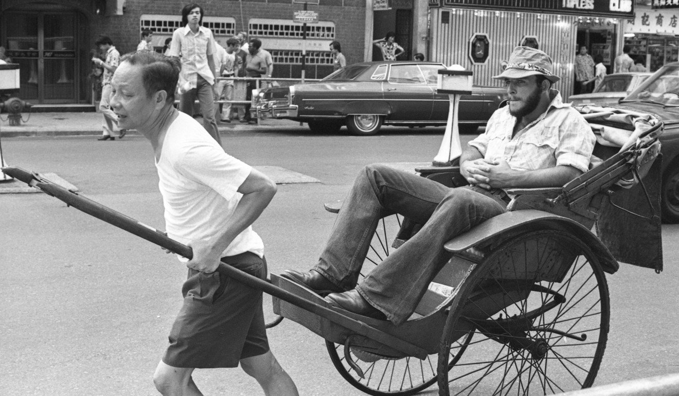 A tourist riding a rickshaw in Wan Chai in 1977. Picture: SCMP