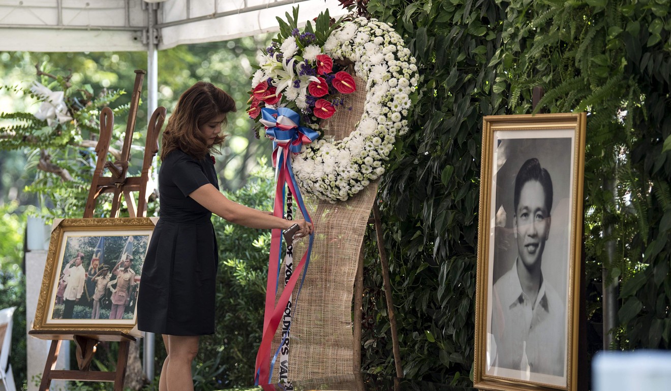 Imee Marcos, daughter of the late dictator Ferdinand Marcos, visits her father’s tomb at the Heroes Cemetery in Manila, Philippines. Photo: AFP